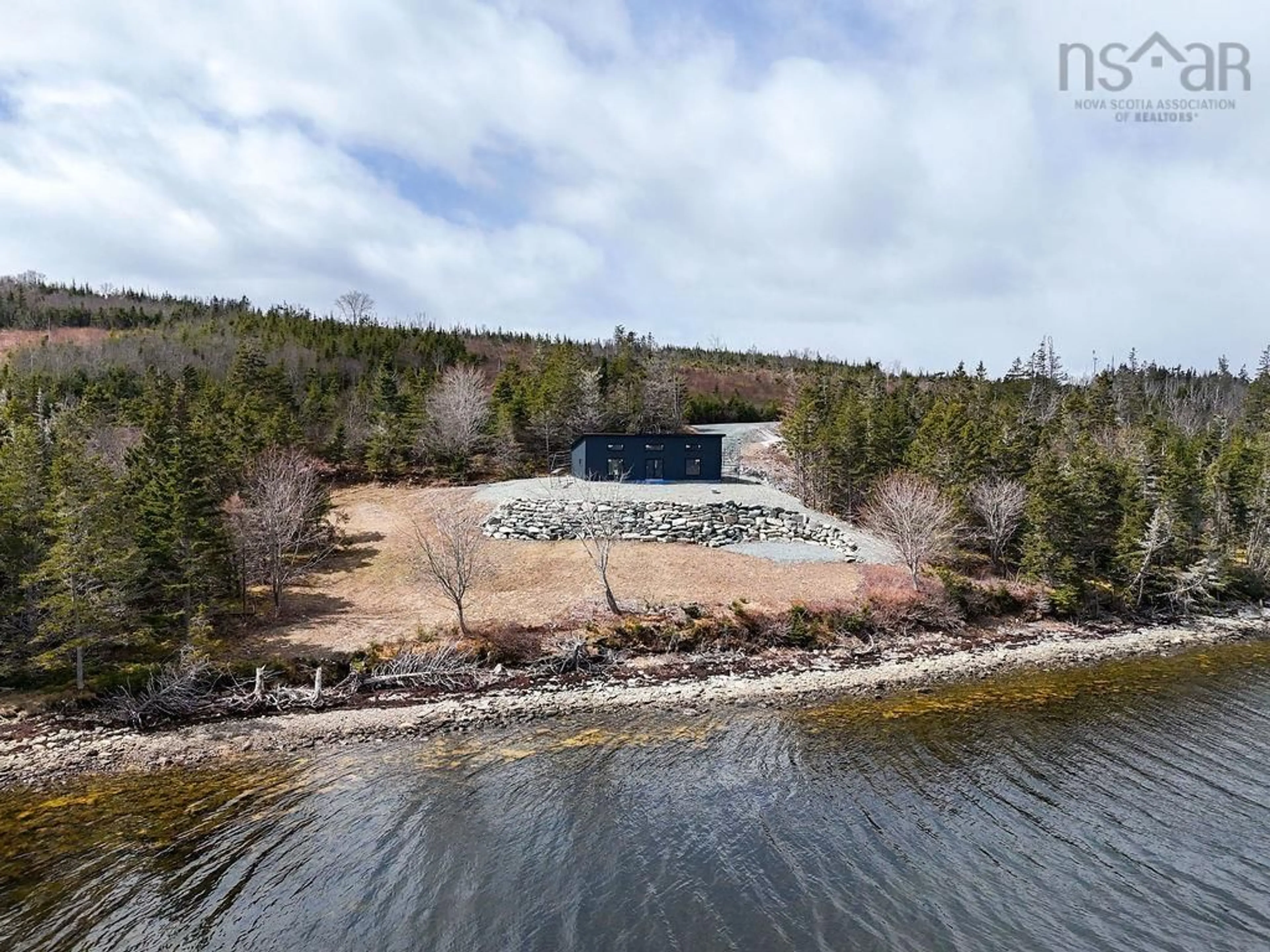 A pic from outside/outdoor area/front of a property/back of a property/a pic from drone, water/lake/river/ocean view for 659 West Liscomb Point Rd, Liscomb Nova Scotia B0A 2J0