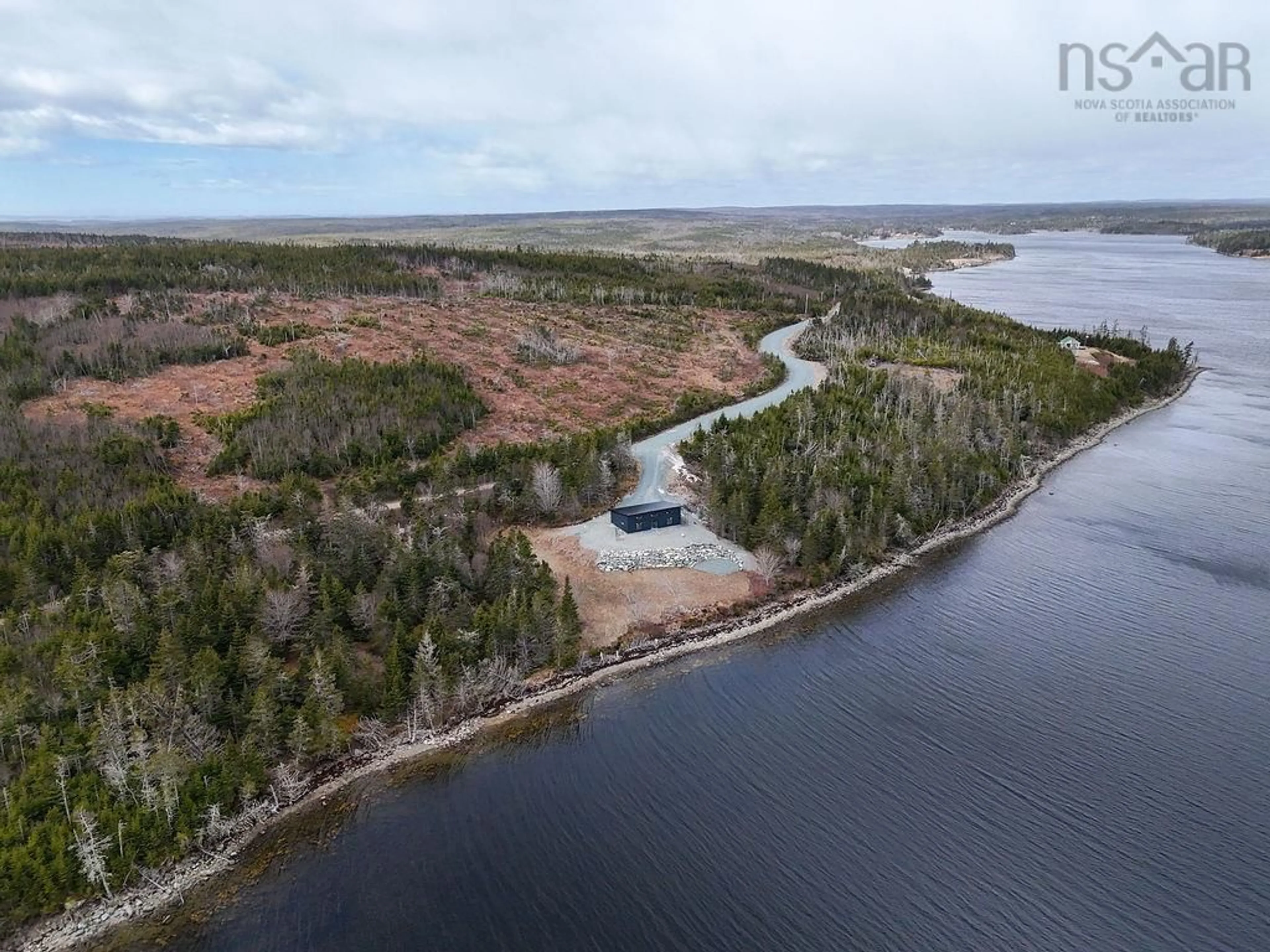 A pic from outside/outdoor area/front of a property/back of a property/a pic from drone, water/lake/river/ocean view for 659 West Liscomb Point Rd, Liscomb Nova Scotia B0A 2J0