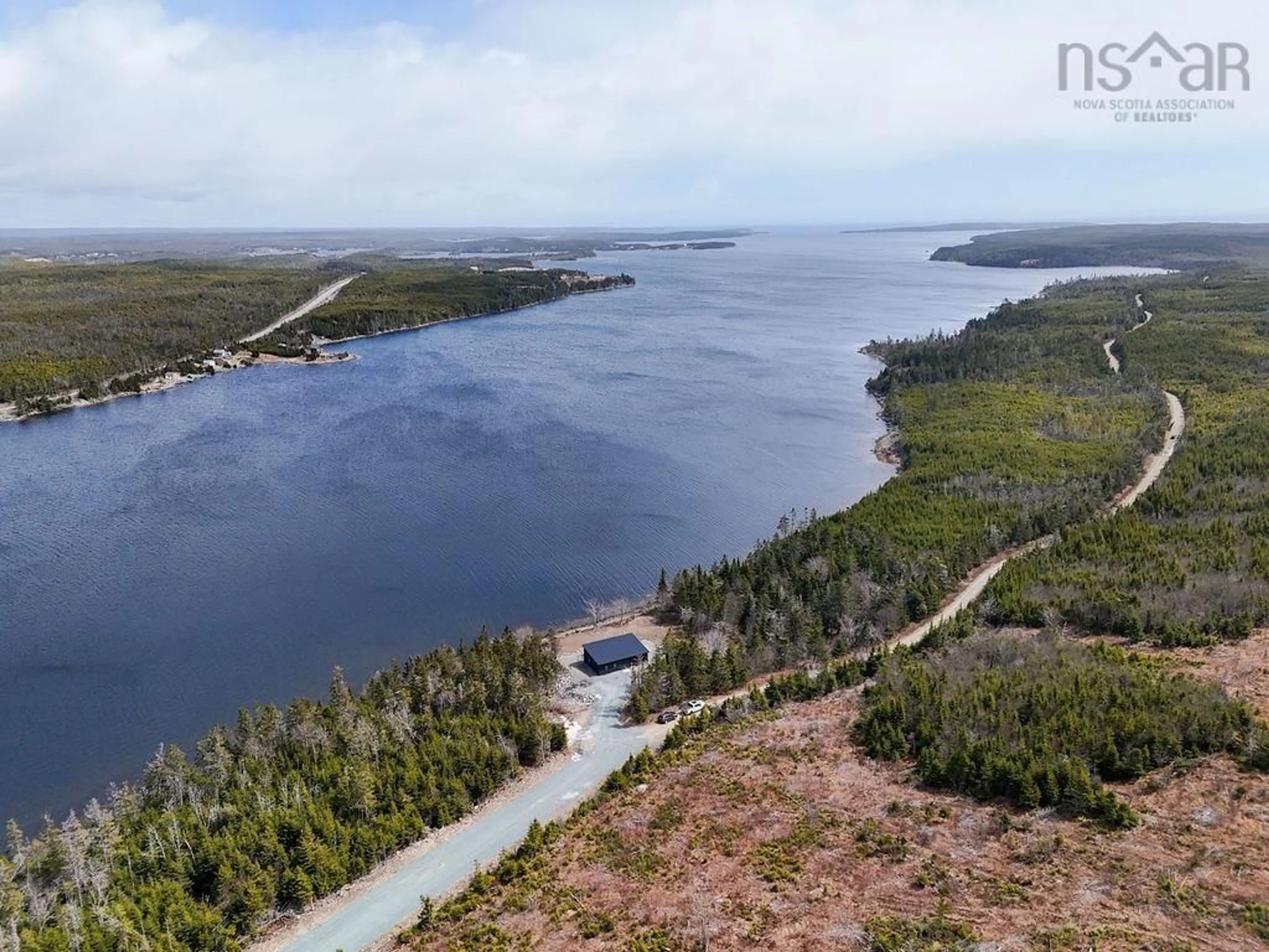 A pic from outside/outdoor area/front of a property/back of a property/a pic from drone, water/lake/river/ocean view for 659 West Liscomb Point Rd, Liscomb Nova Scotia B0A 2J0