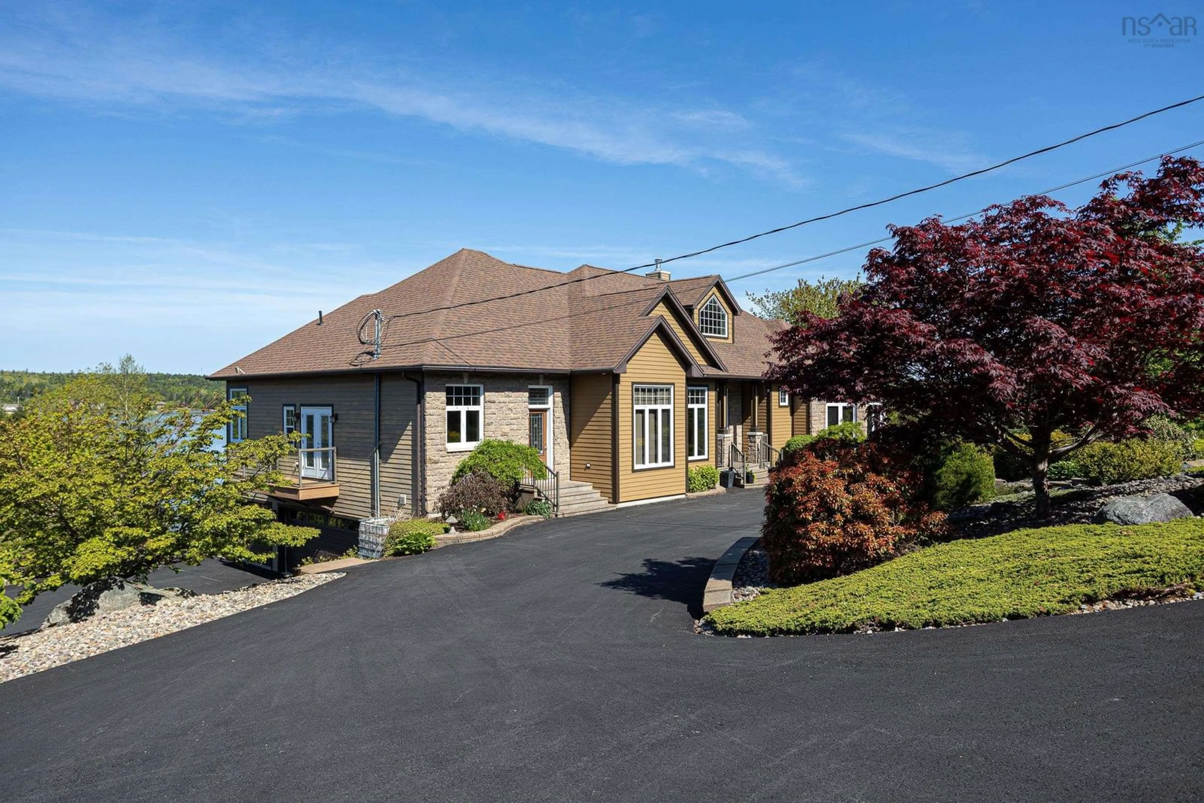 A pic from outside/outdoor area/front of a property/back of a property/a pic from drone, street for 16 Joan Elizabeth Way, Porters Lake Nova Scotia B3E 1N9