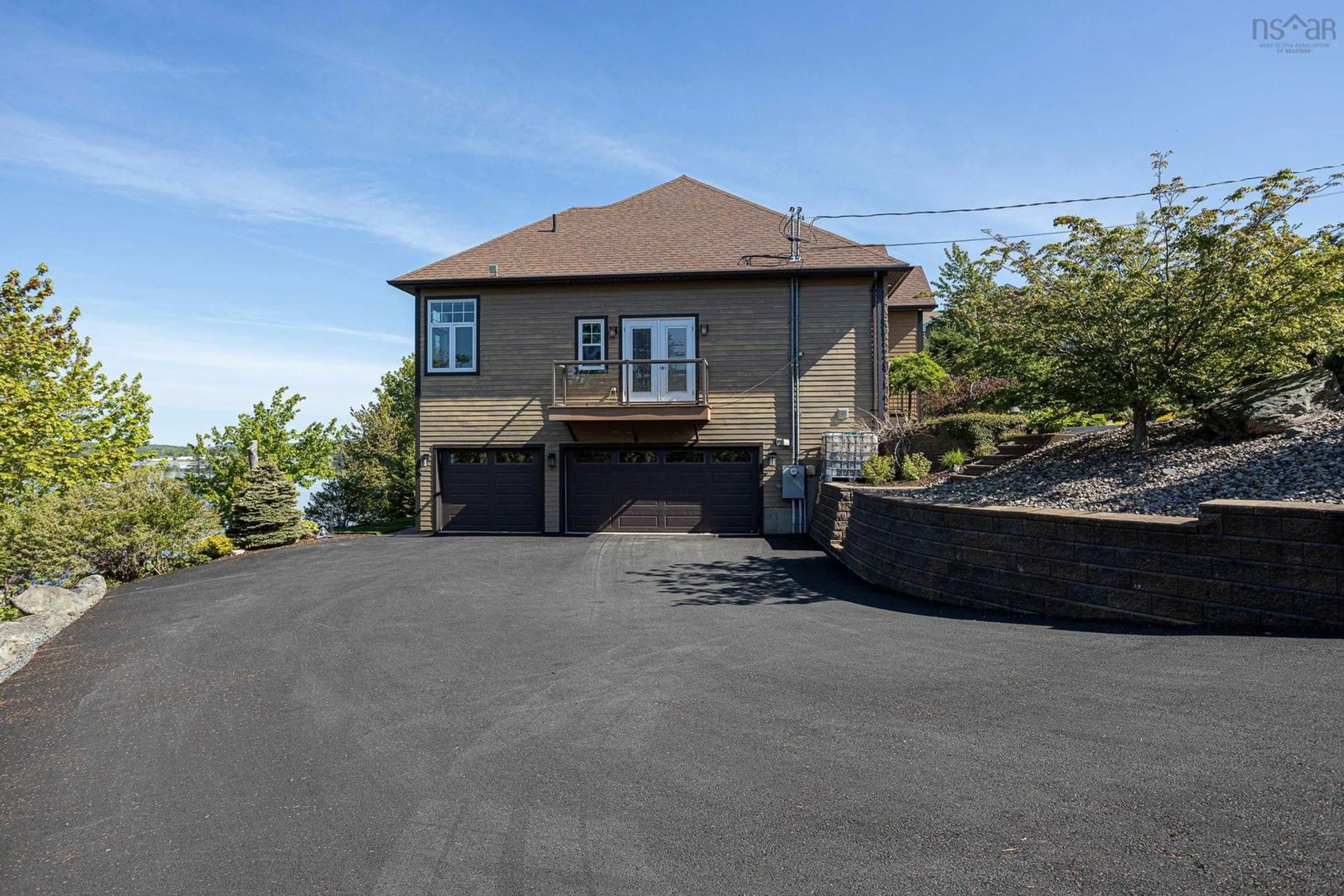 A pic from outside/outdoor area/front of a property/back of a property/a pic from drone, street for 16 Joan Elizabeth Way, Porters Lake Nova Scotia B3E 1N9