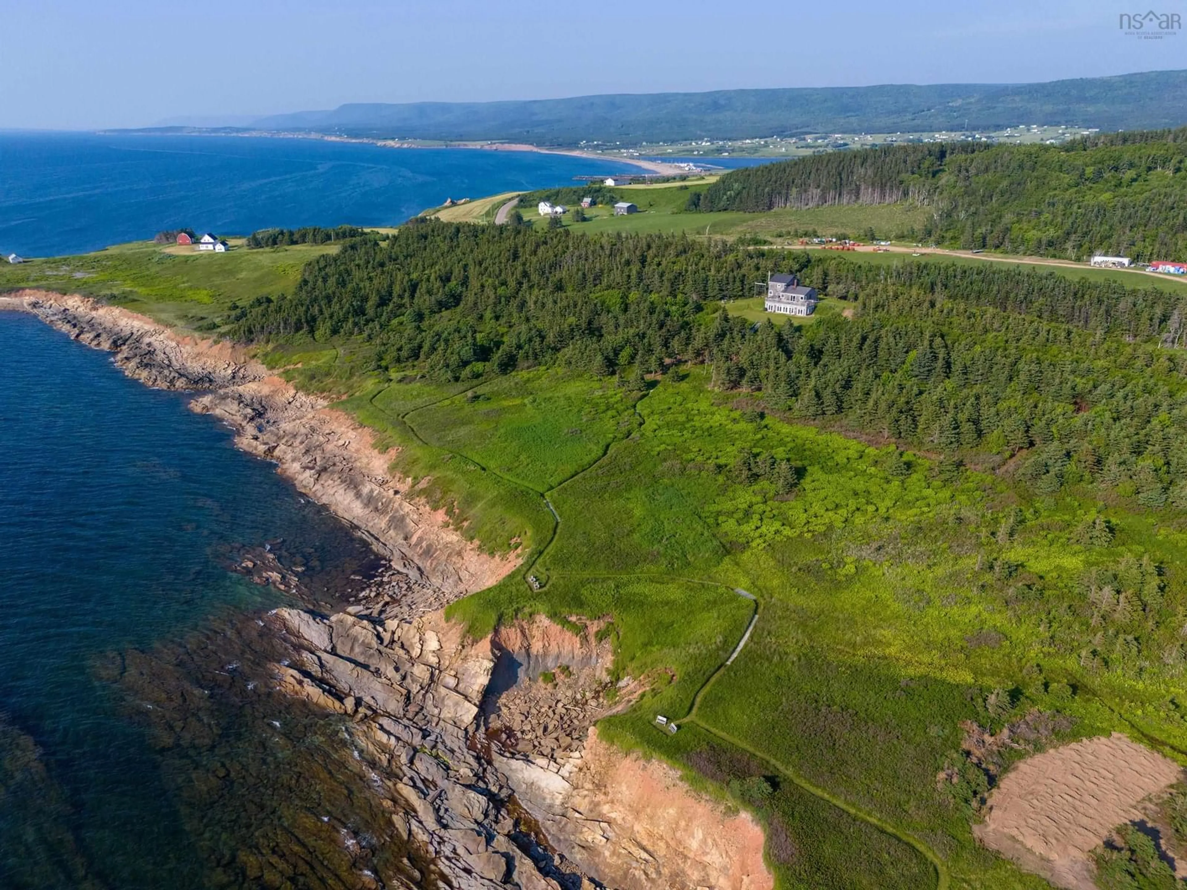 A pic from outside/outdoor area/front of a property/back of a property/a pic from drone, water/lake/river/ocean view for 3589 Shore Rd, Margaree Harbour Nova Scotia B0E 2B0