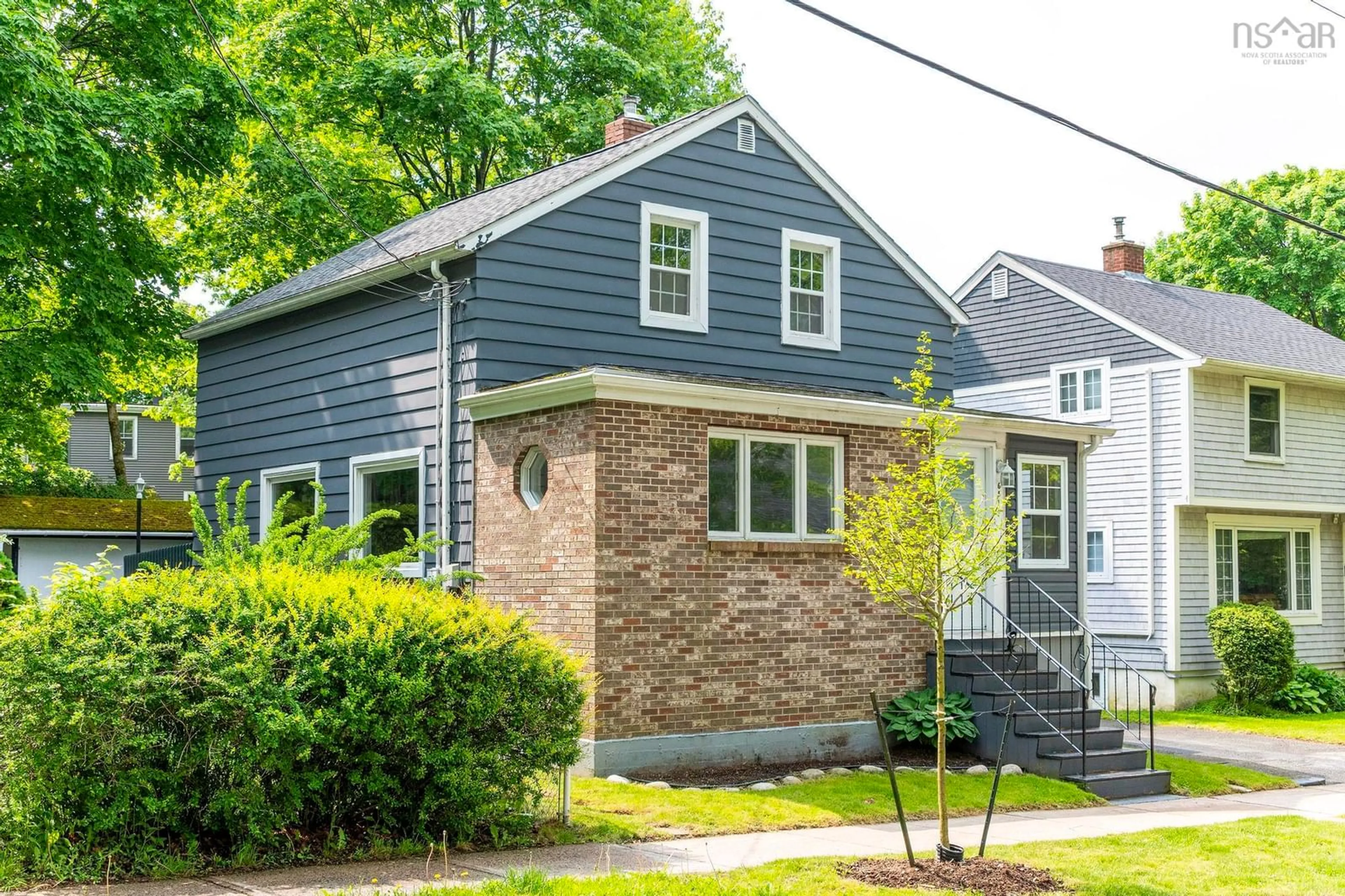Home with vinyl exterior material, street for 6516 Summit St, Halifax Nova Scotia B3L 1S3
