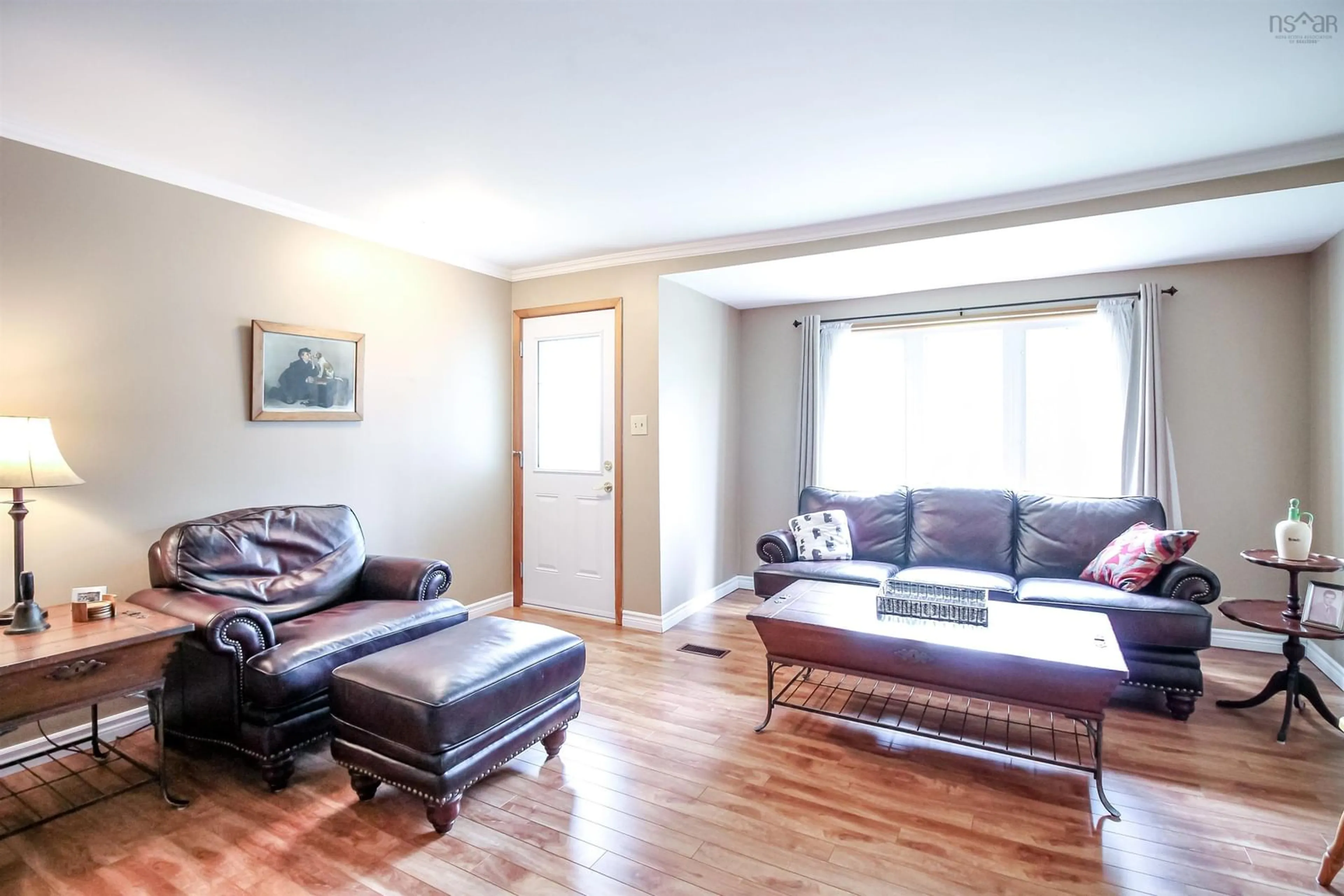 Living room with furniture, wood/laminate floor for 65 Centre St, Truro Nova Scotia B2N 2K1