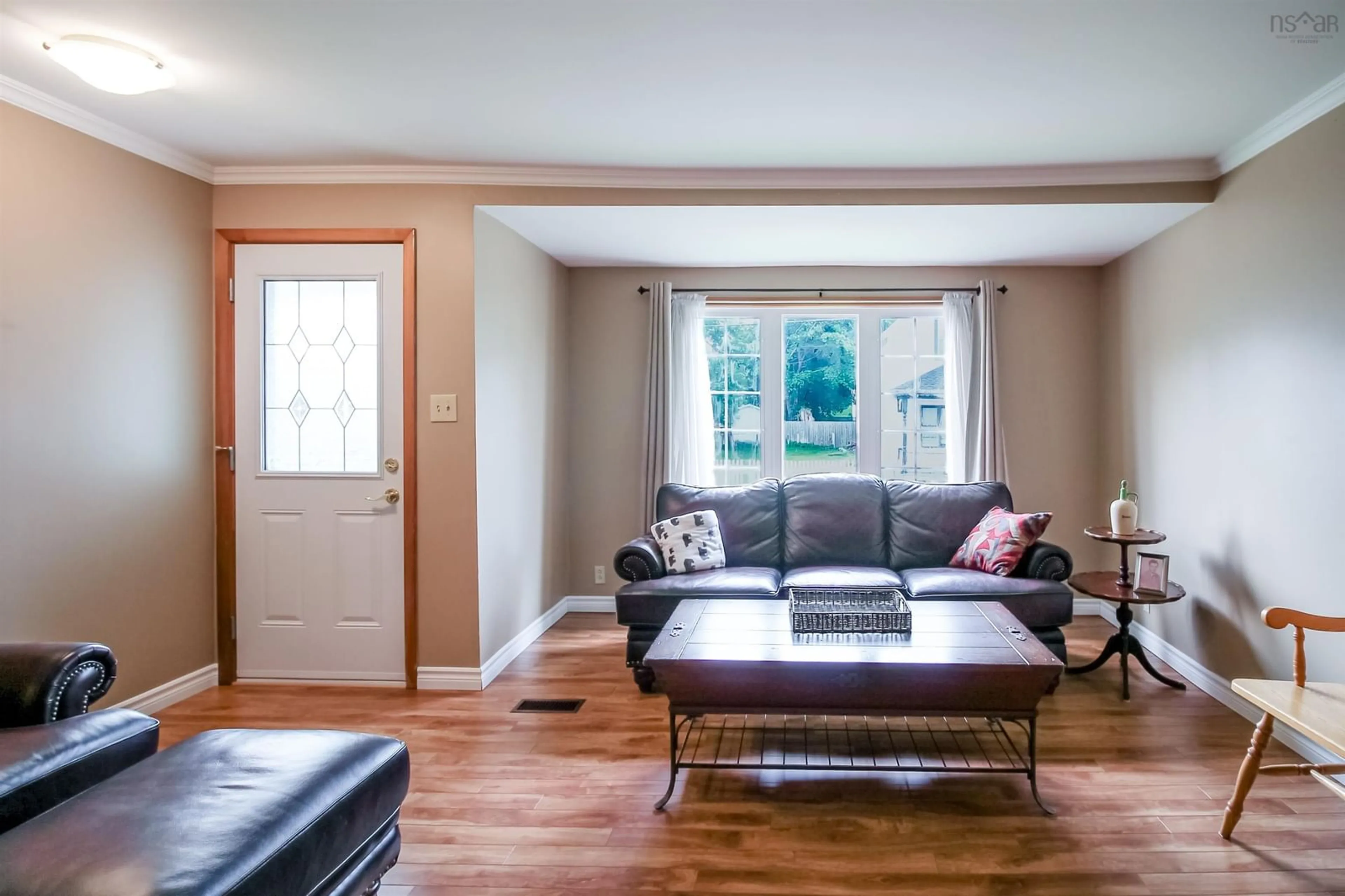Living room with furniture, wood/laminate floor for 65 Centre St, Truro Nova Scotia B2N 2K1