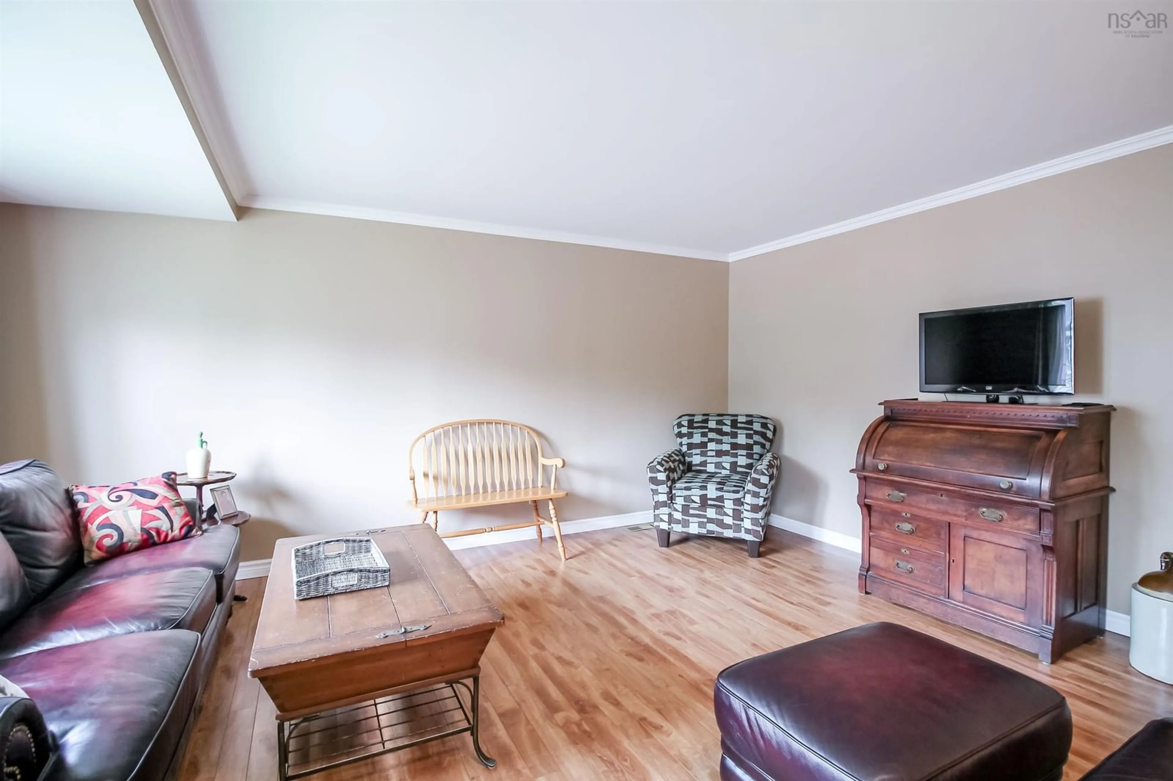 Living room with furniture, wood/laminate floor for 65 Centre St, Truro Nova Scotia B2N 2K1