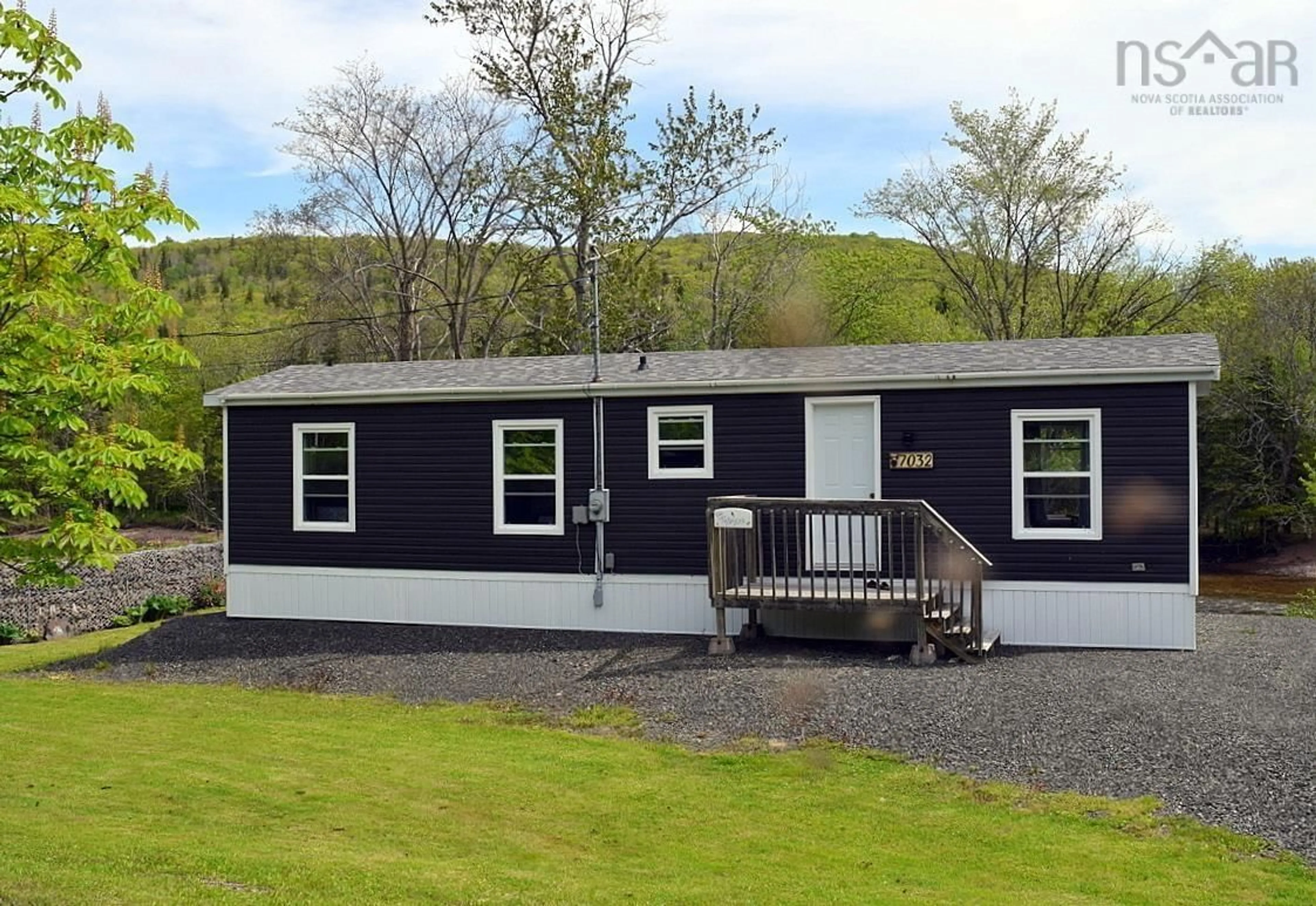 Home with vinyl exterior material, unknown for 7032 Cabot Trail, Margaree Nova Scotia B0E 2H0