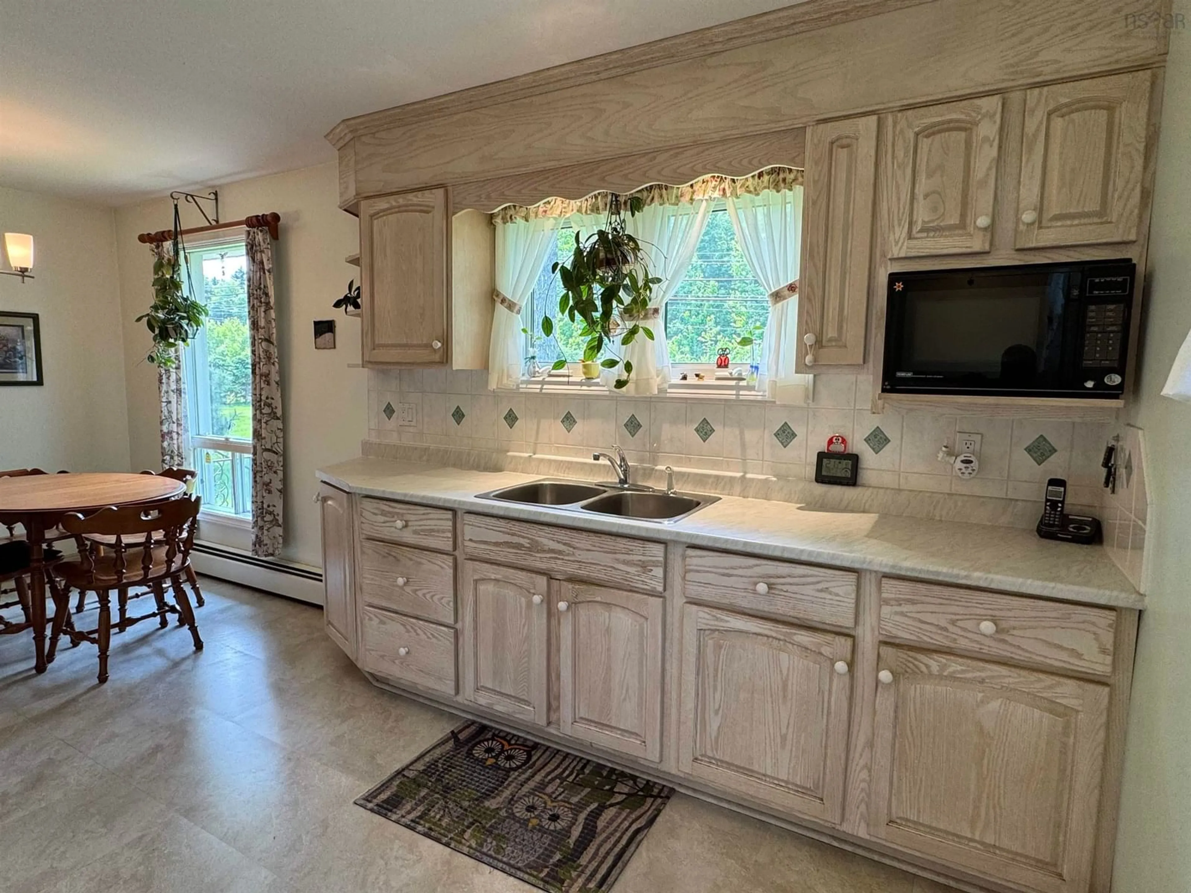 Open concept kitchen, ceramic/tile floor for 4438 Little Harbour Rd, Frasers Mountain Nova Scotia B2H 5C4