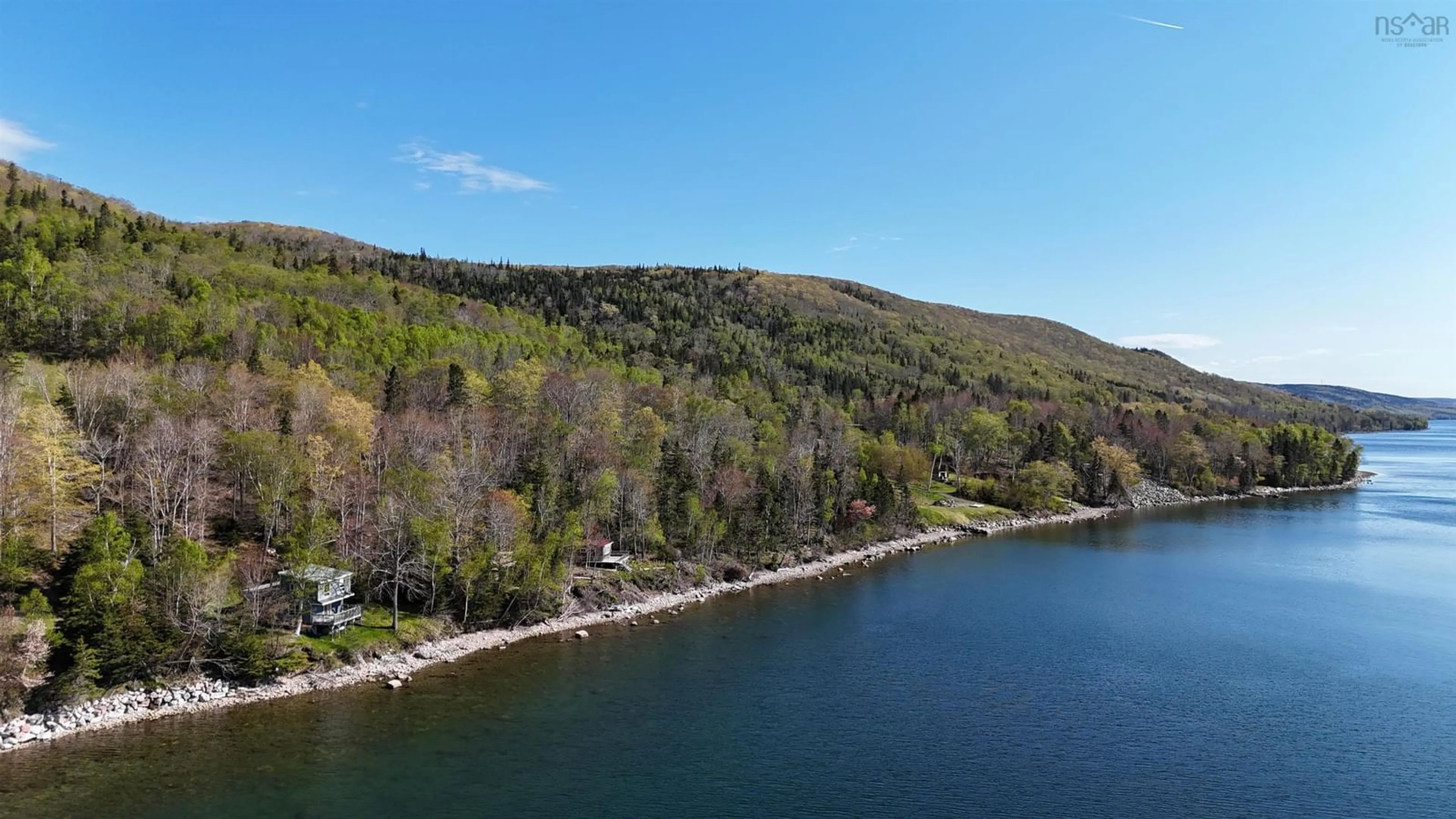 A pic from outside/outdoor area/front of a property/back of a property/a pic from drone, water/lake/river/ocean view for Marble Mountain Rd., Lime Hill Nova Scotia B0E 3K0