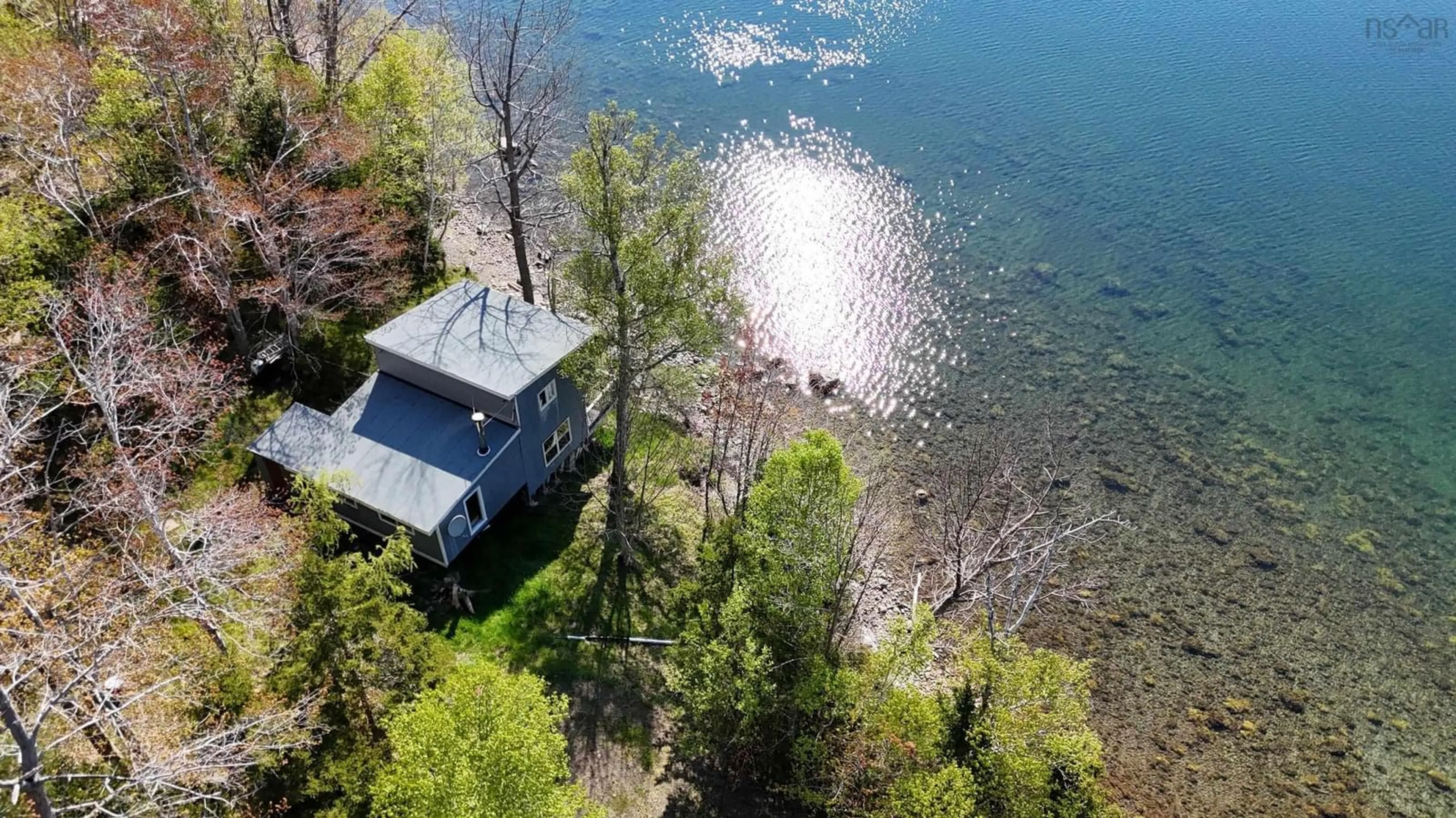 A pic from outside/outdoor area/front of a property/back of a property/a pic from drone, water/lake/river/ocean view for Marble Mountain Rd., Lime Hill Nova Scotia B0E 3K0