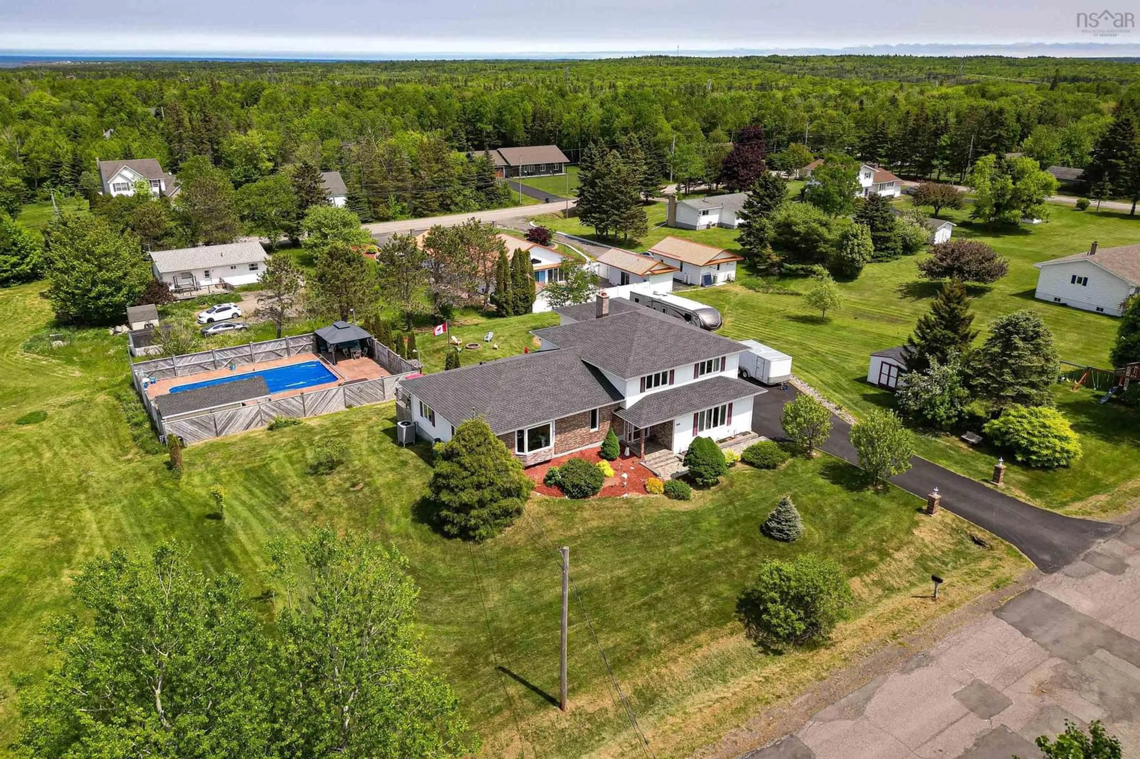 A pic from outside/outdoor area/front of a property/back of a property/a pic from drone, water/lake/river/ocean view for 188 Sunrise Dr, Georges River Nova Scotia B1Y 3B5