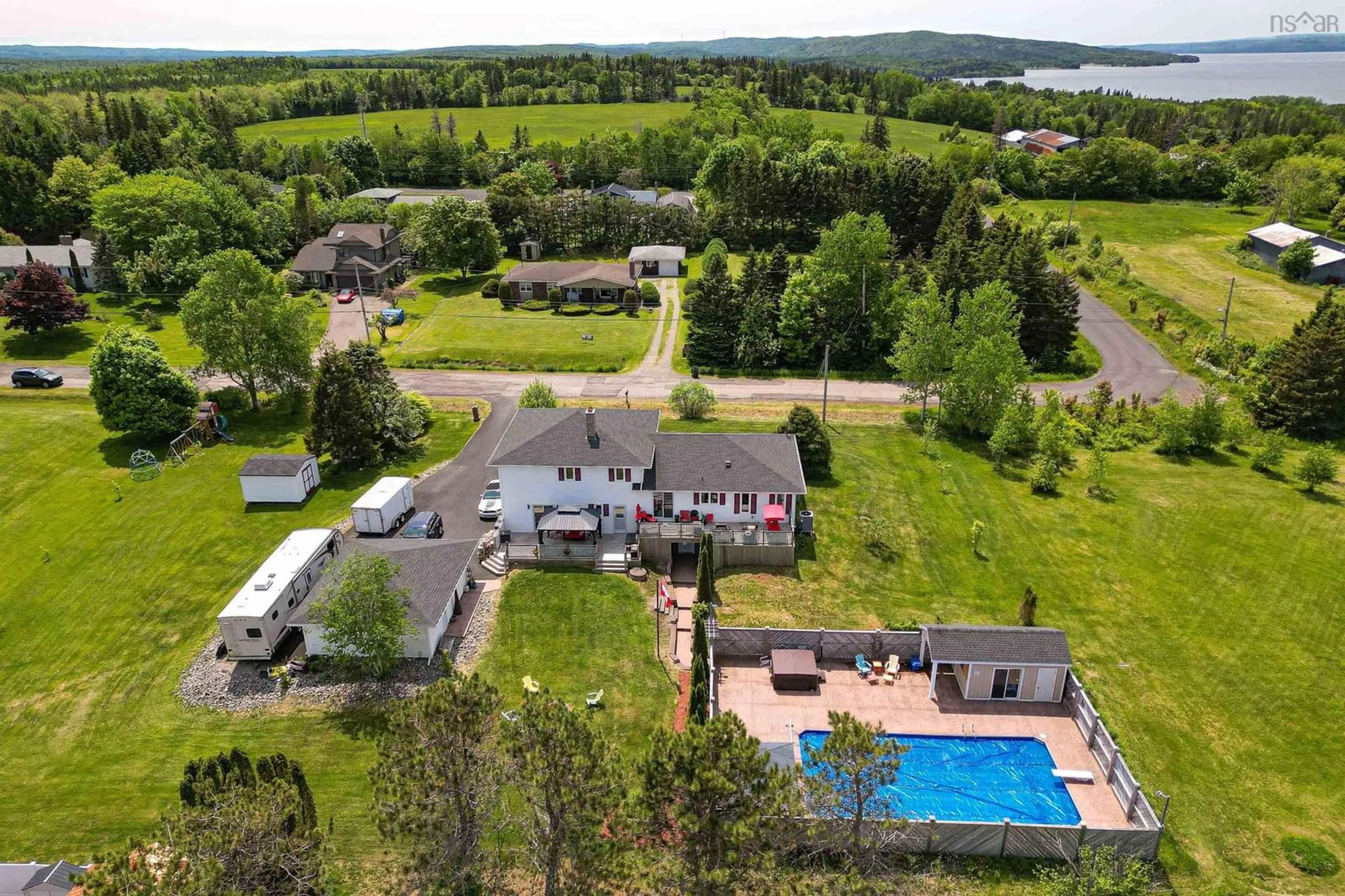 A pic from outside/outdoor area/front of a property/back of a property/a pic from drone, water/lake/river/ocean view for 188 Sunrise Dr, Georges River Nova Scotia B1Y 3B5