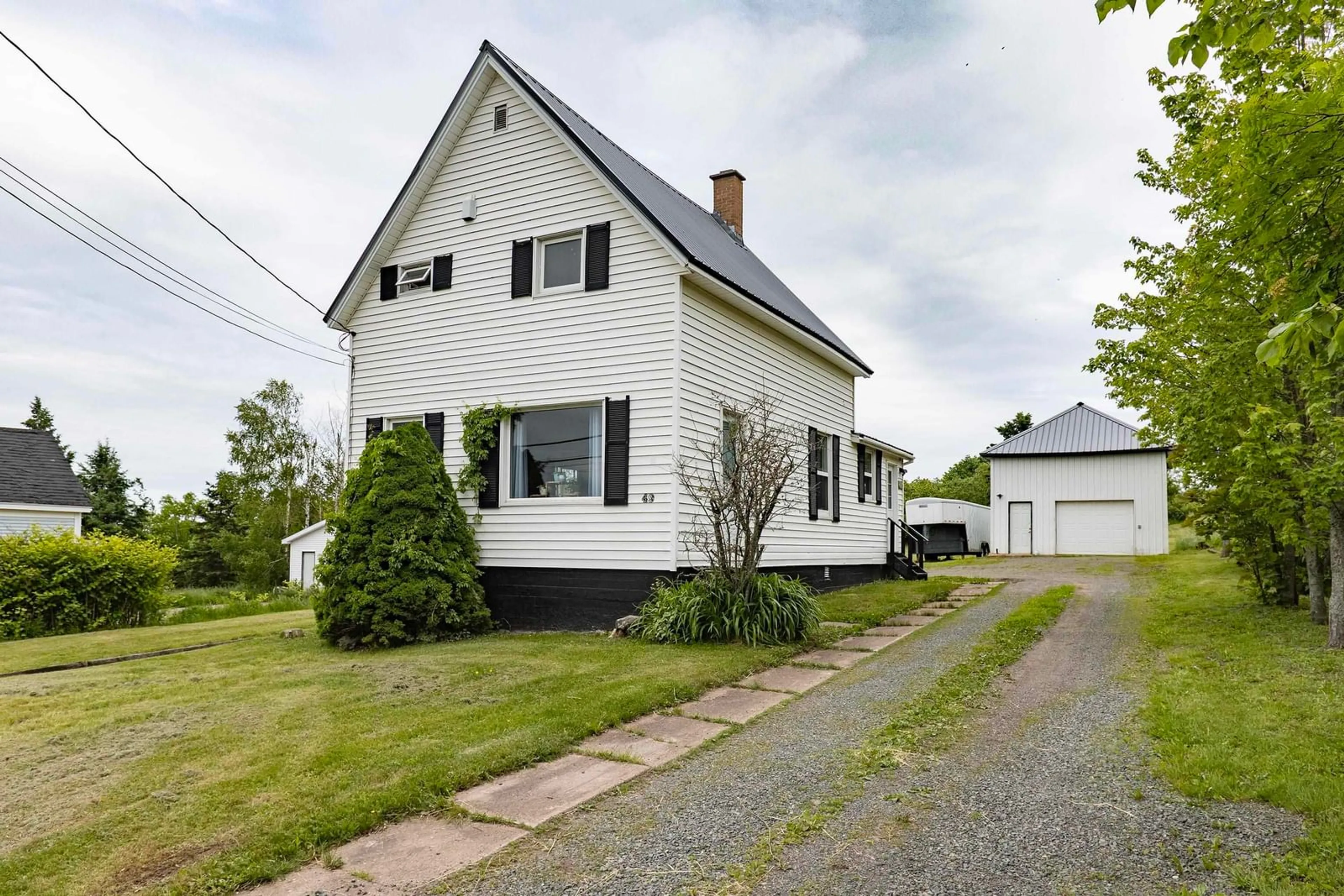 A pic from outside/outdoor area/front of a property/back of a property/a pic from drone, street for 49 Junction Rd, Springhill Nova Scotia B0M 1X0
