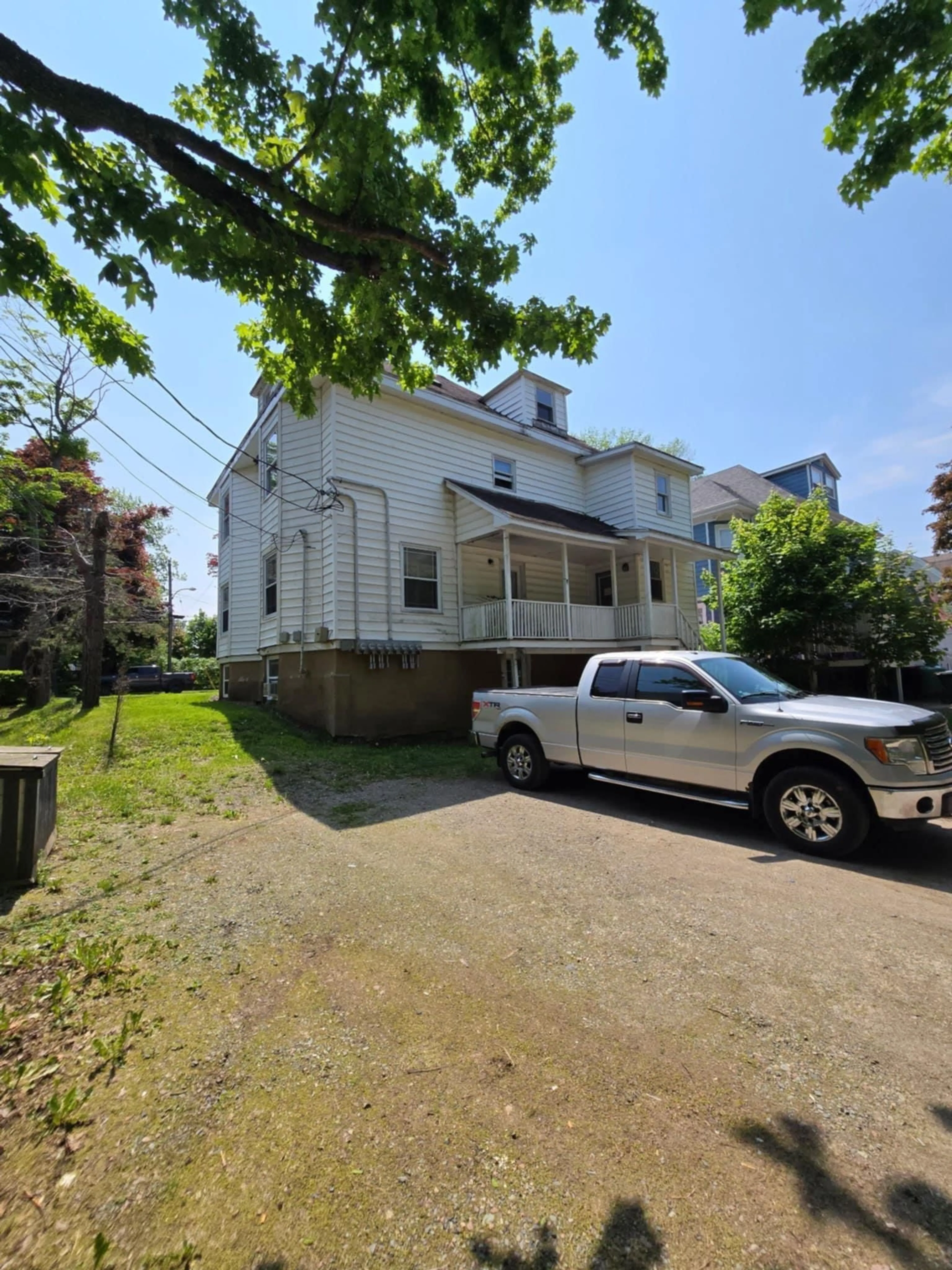 A pic from outside/outdoor area/front of a property/back of a property/a pic from drone, street for 85 Whitney Ave, Sydney Nova Scotia B1P 4Z8