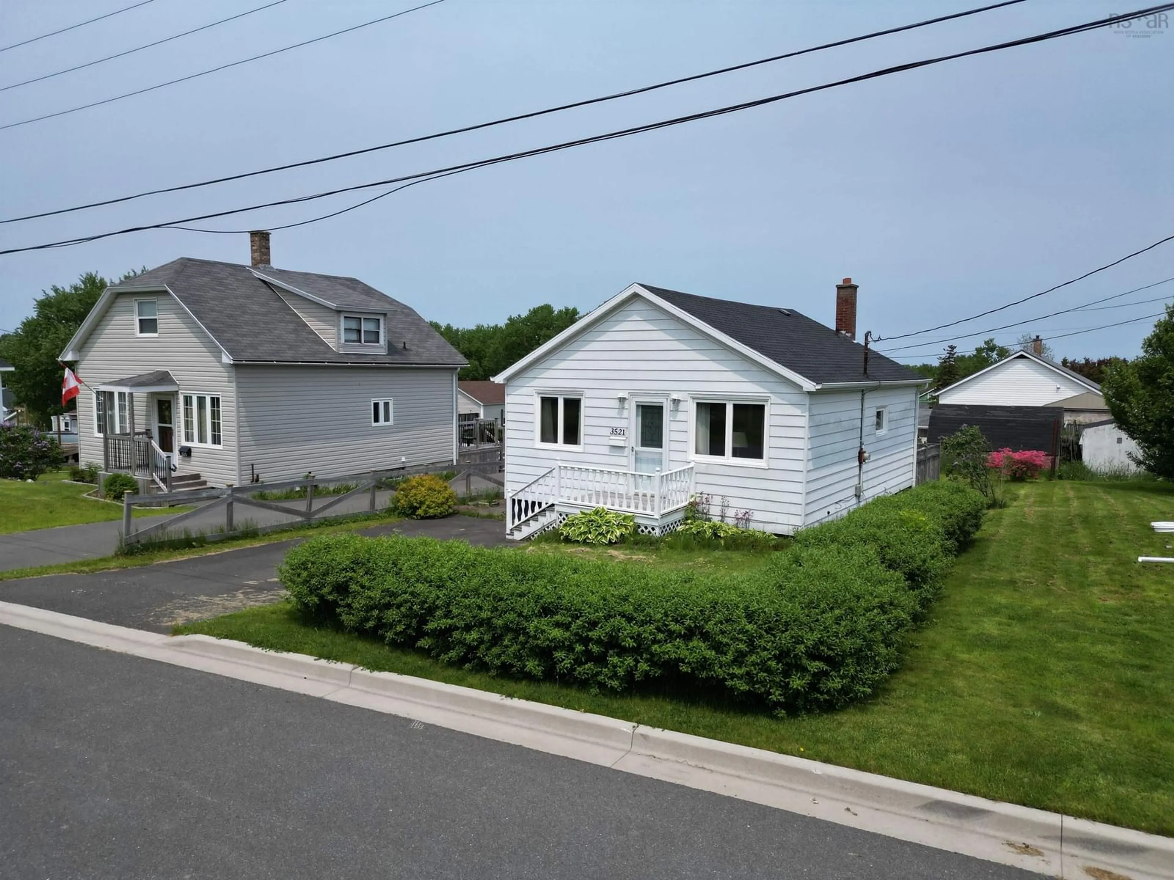 A pic from outside/outdoor area/front of a property/back of a property/a pic from drone, street for 3521 Fenton Avenue, New Waterford Nova Scotia B1H 2A8