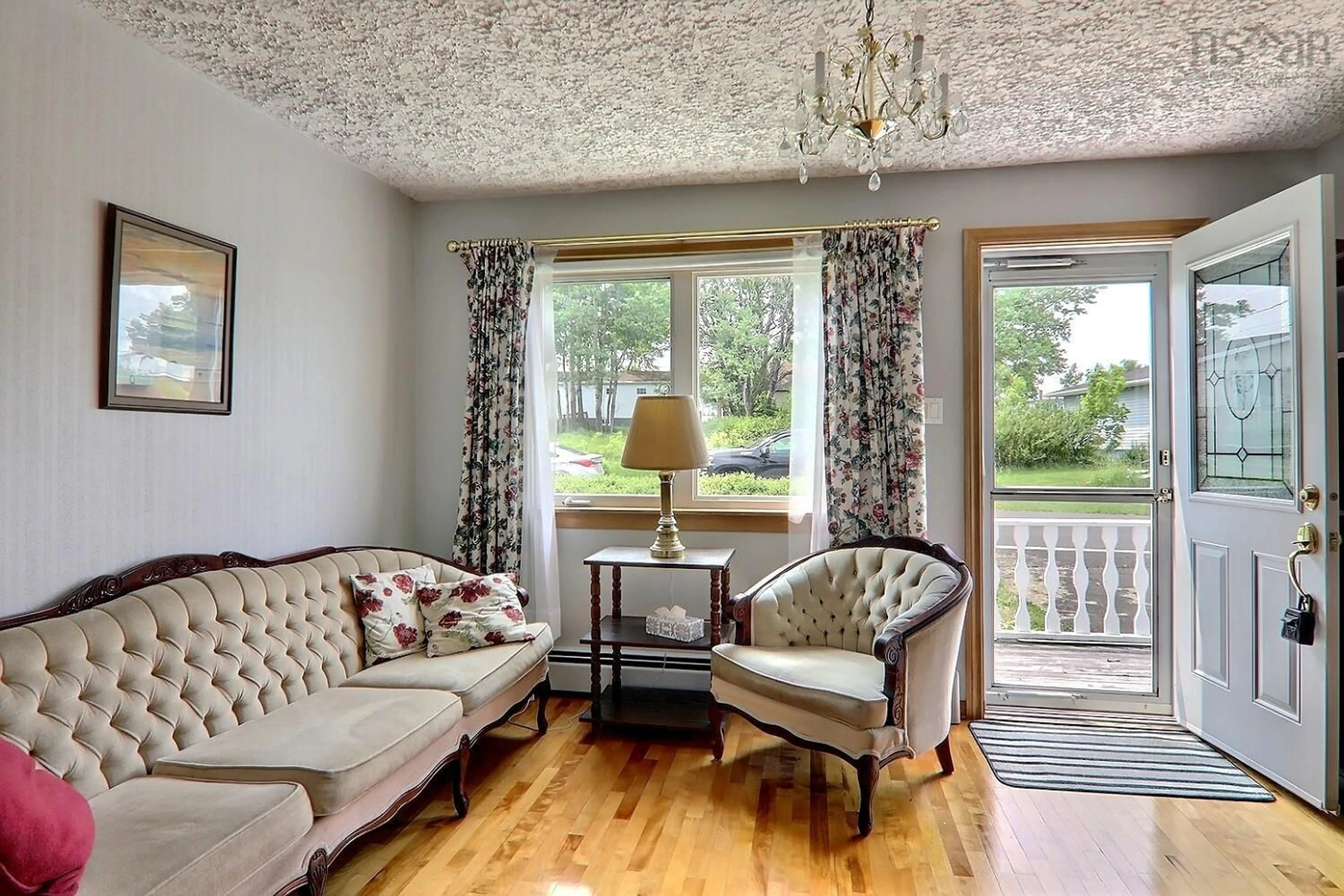 Living room with furniture, wood/laminate floor for 3521 Fenton Avenue, New Waterford Nova Scotia B1H 2A8