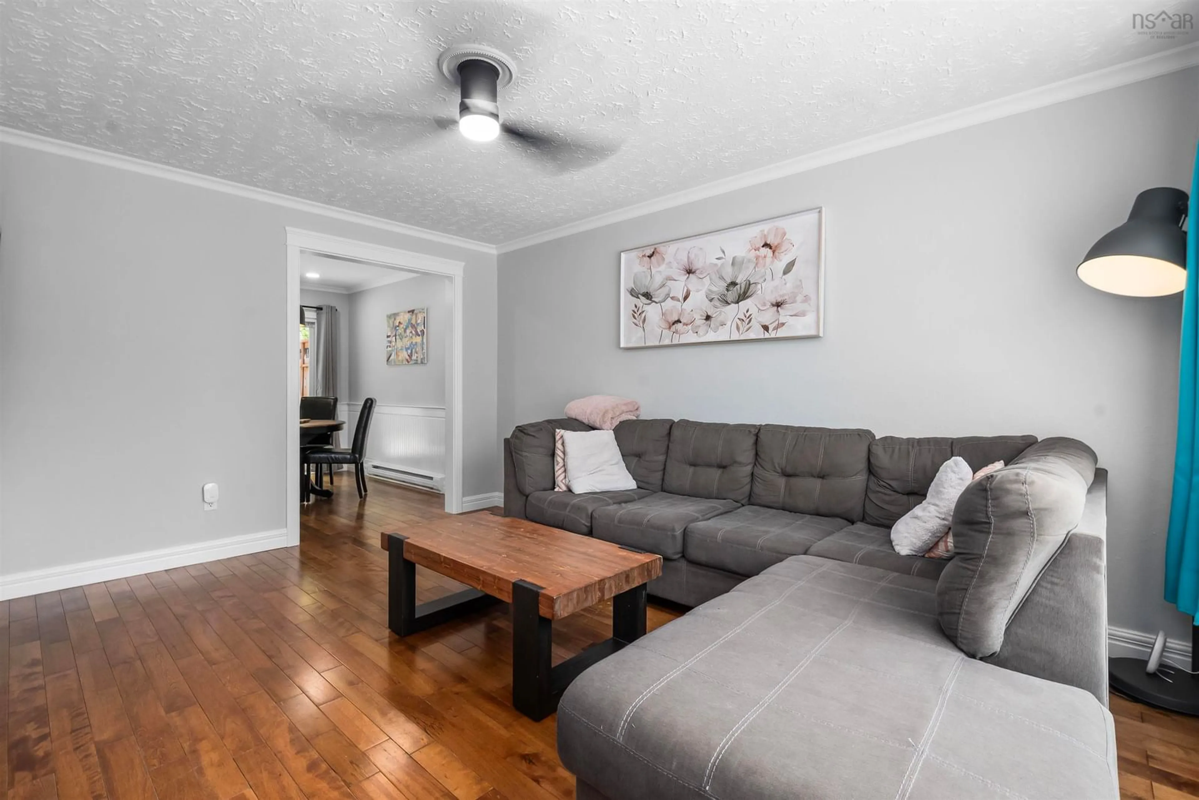 Living room with furniture, wood/laminate floor for 196 Rankin Dr, Lower Sackville Nova Scotia B4C 3B3
