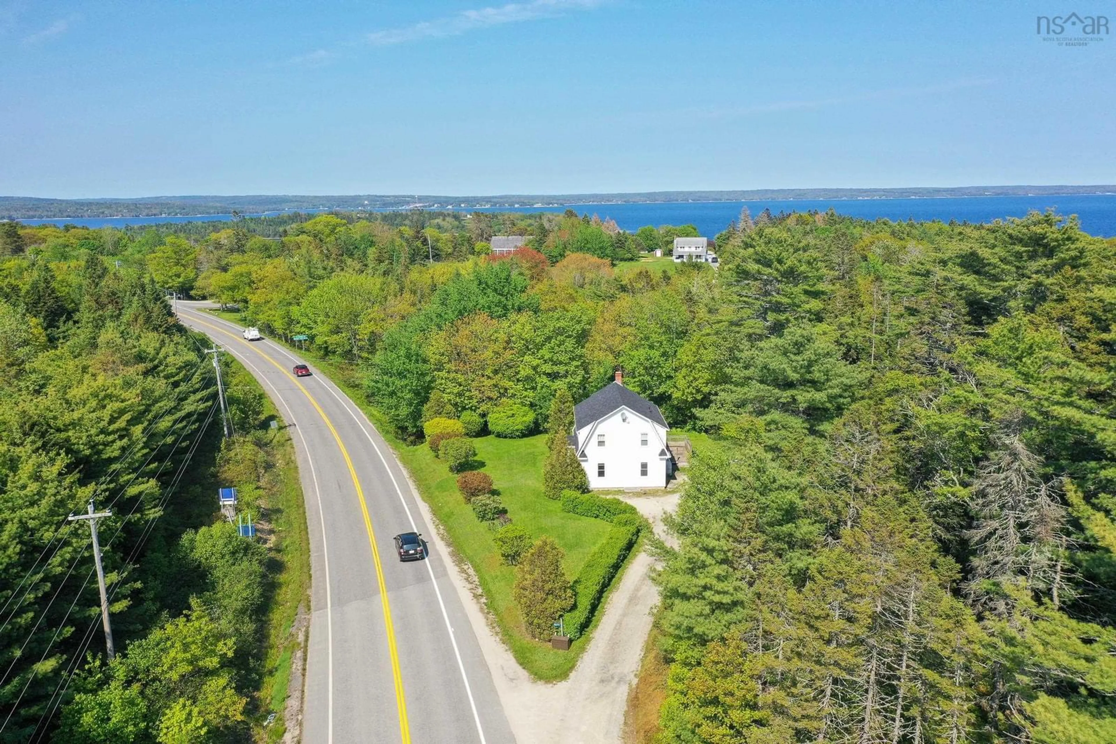 A pic from outside/outdoor area/front of a property/back of a property/a pic from drone, water/lake/river/ocean view for 3577 Highway 3, East Chester Nova Scotia B0J 1J0