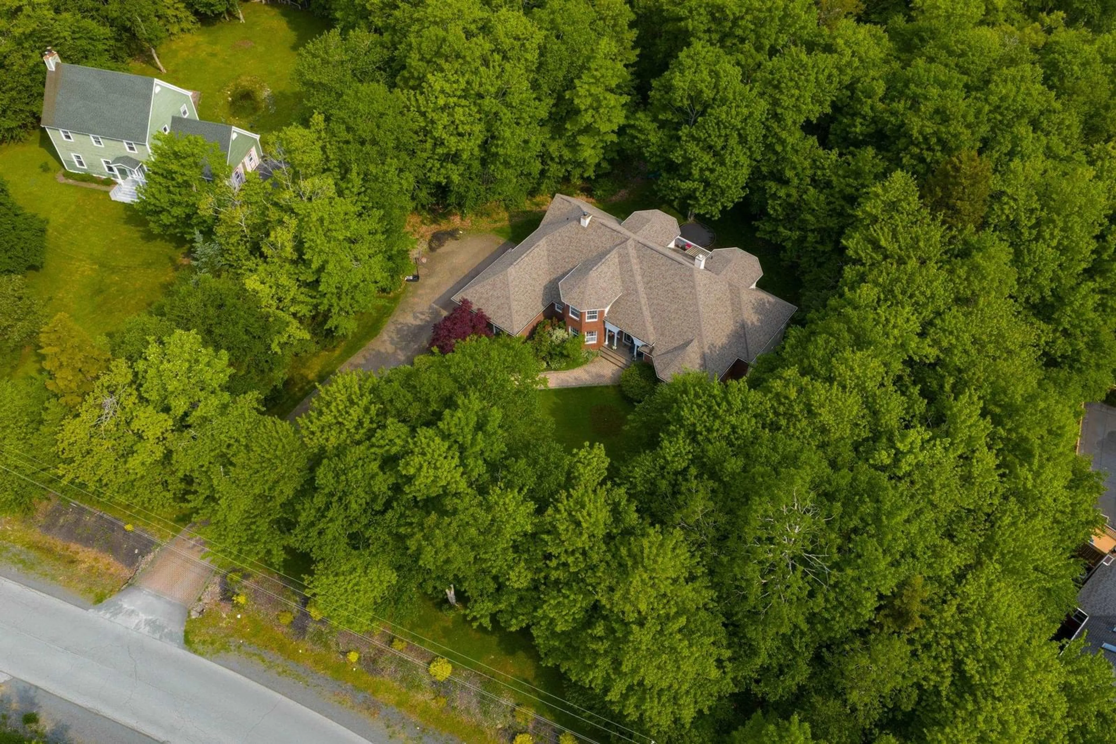 A pic from outside/outdoor area/front of a property/back of a property/a pic from drone, forest/trees view for 14 Club House Lane, Hammonds Plains Nova Scotia B4B 1T4
