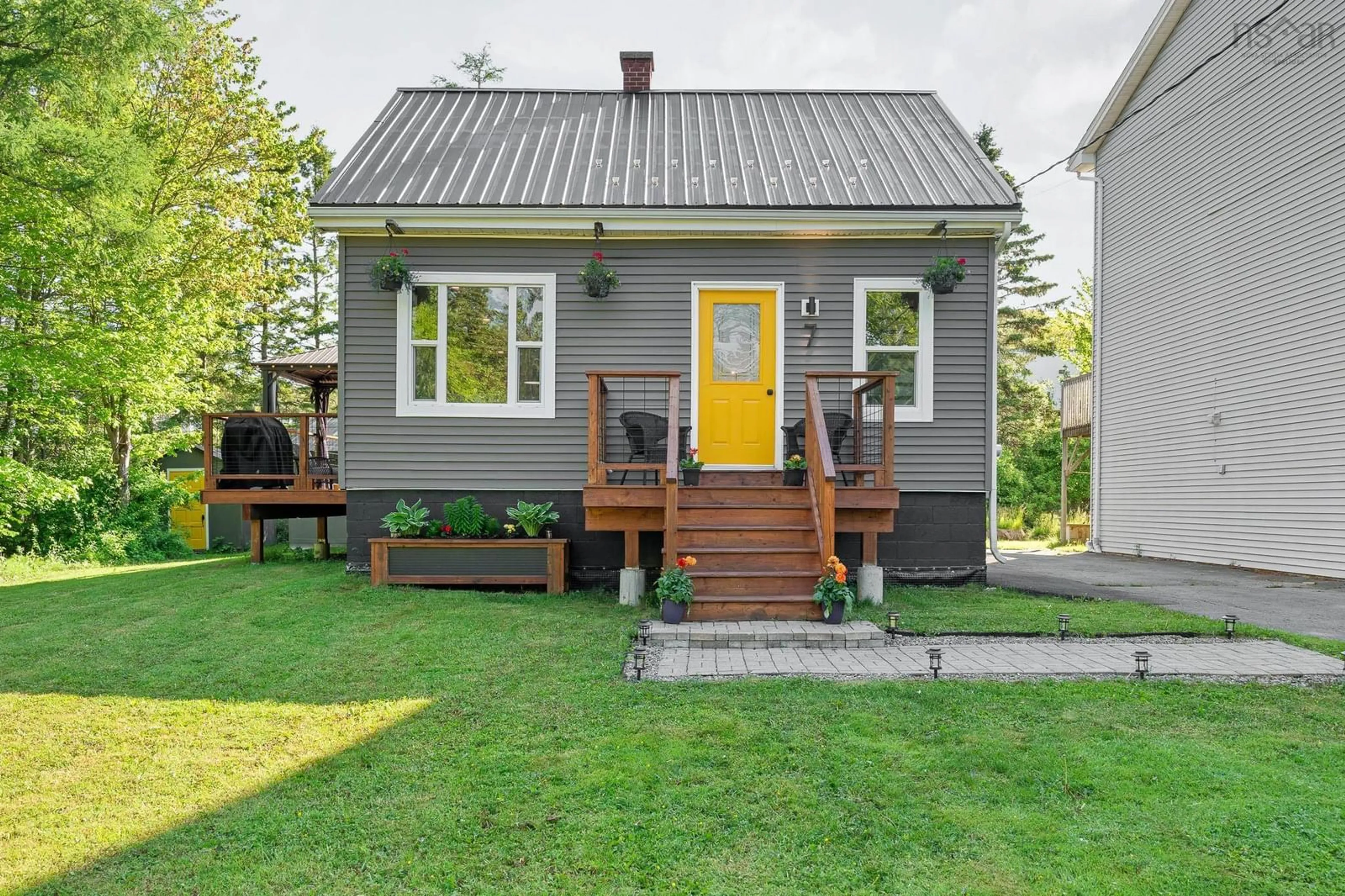 Home with vinyl exterior material, street for 7 Brook St, Bedford Nova Scotia B4A 2H4