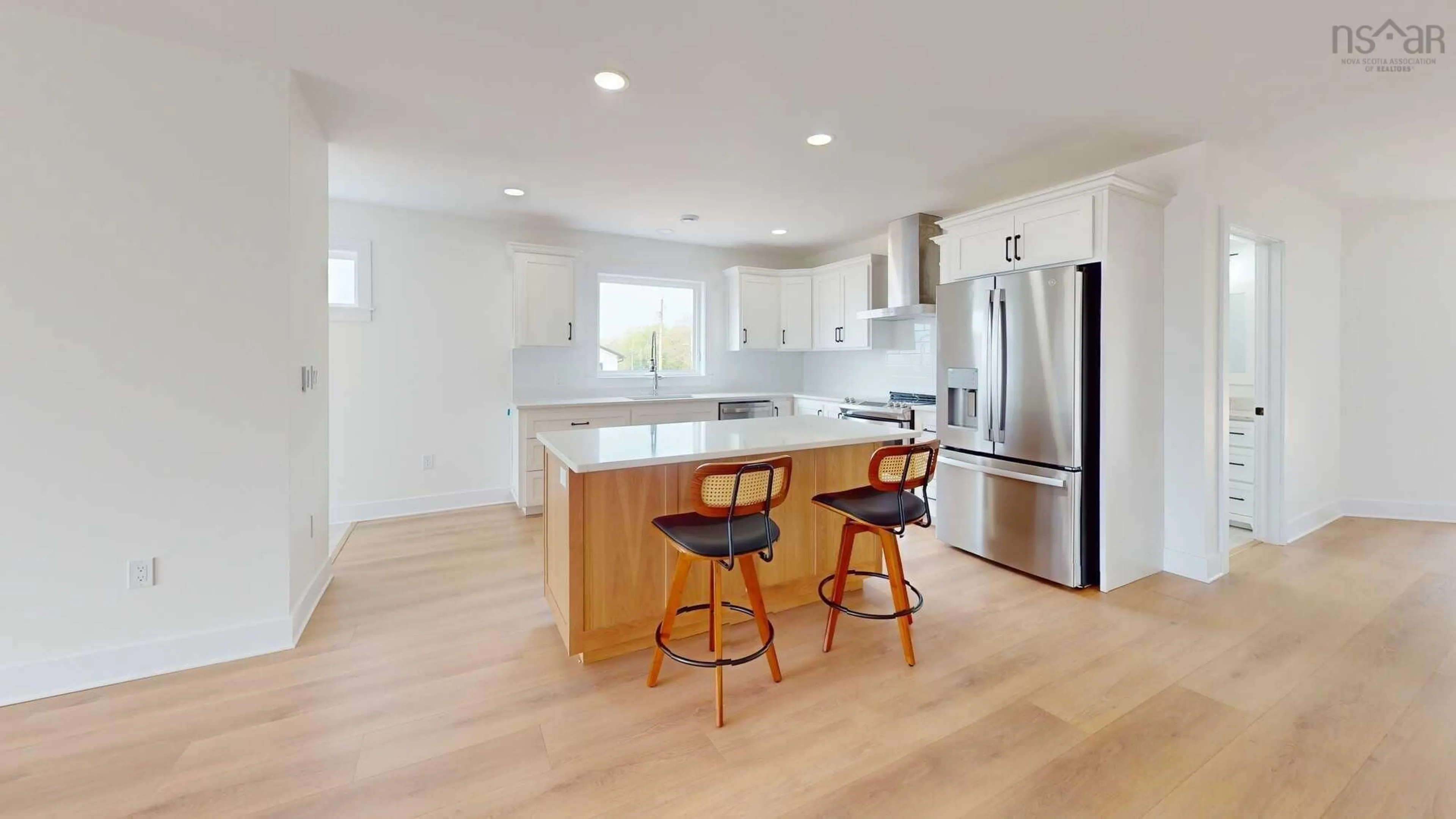 Open concept kitchen, wood/laminate floor for 321 Beeches Rd, Pictou Nova Scotia B0K 1H0