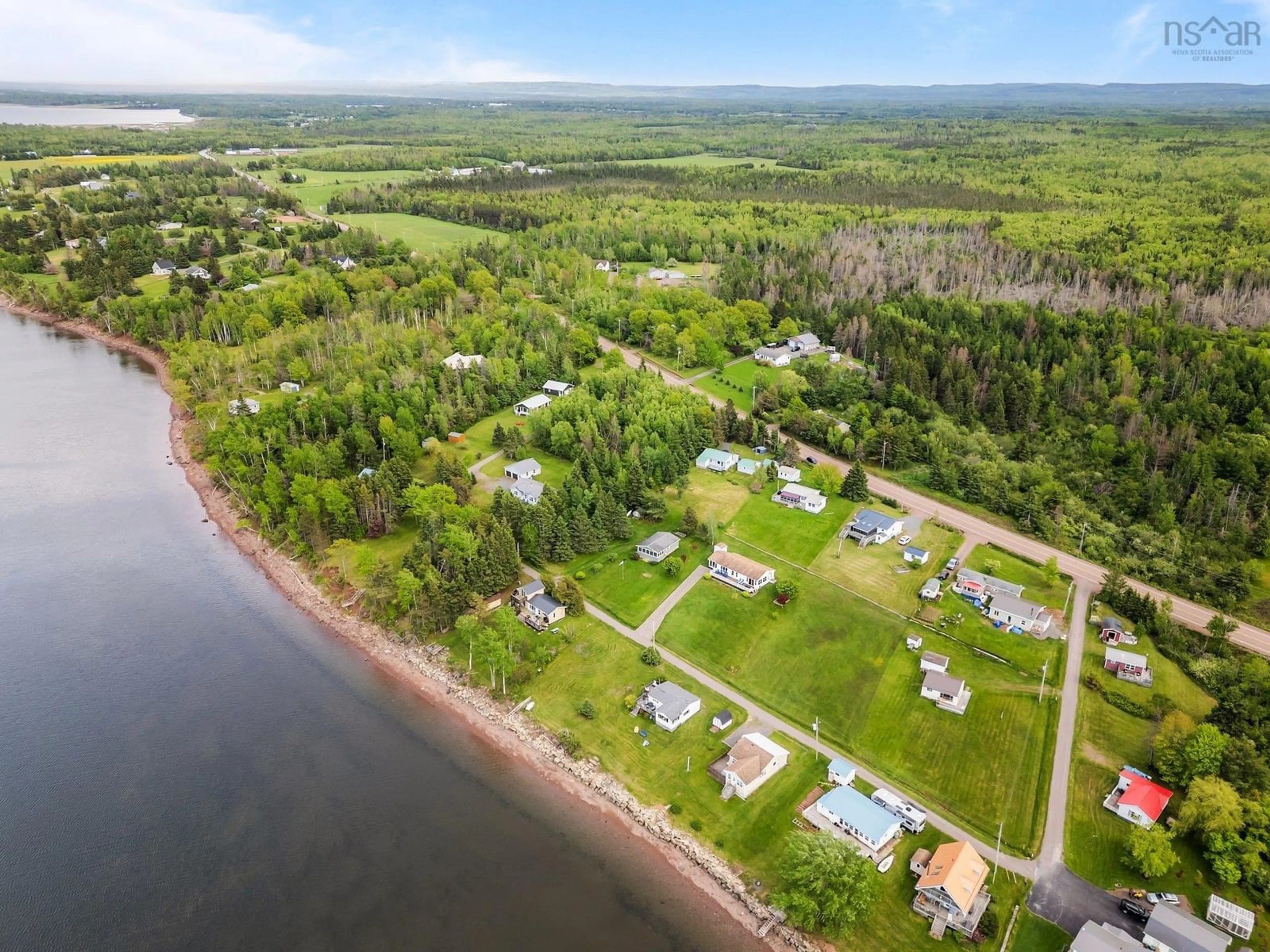 A pic from outside/outdoor area/front of a property/back of a property/a pic from drone, water/lake/river/ocean view for 937 Highway 6, Bayhead Nova Scotia B0K 1V0