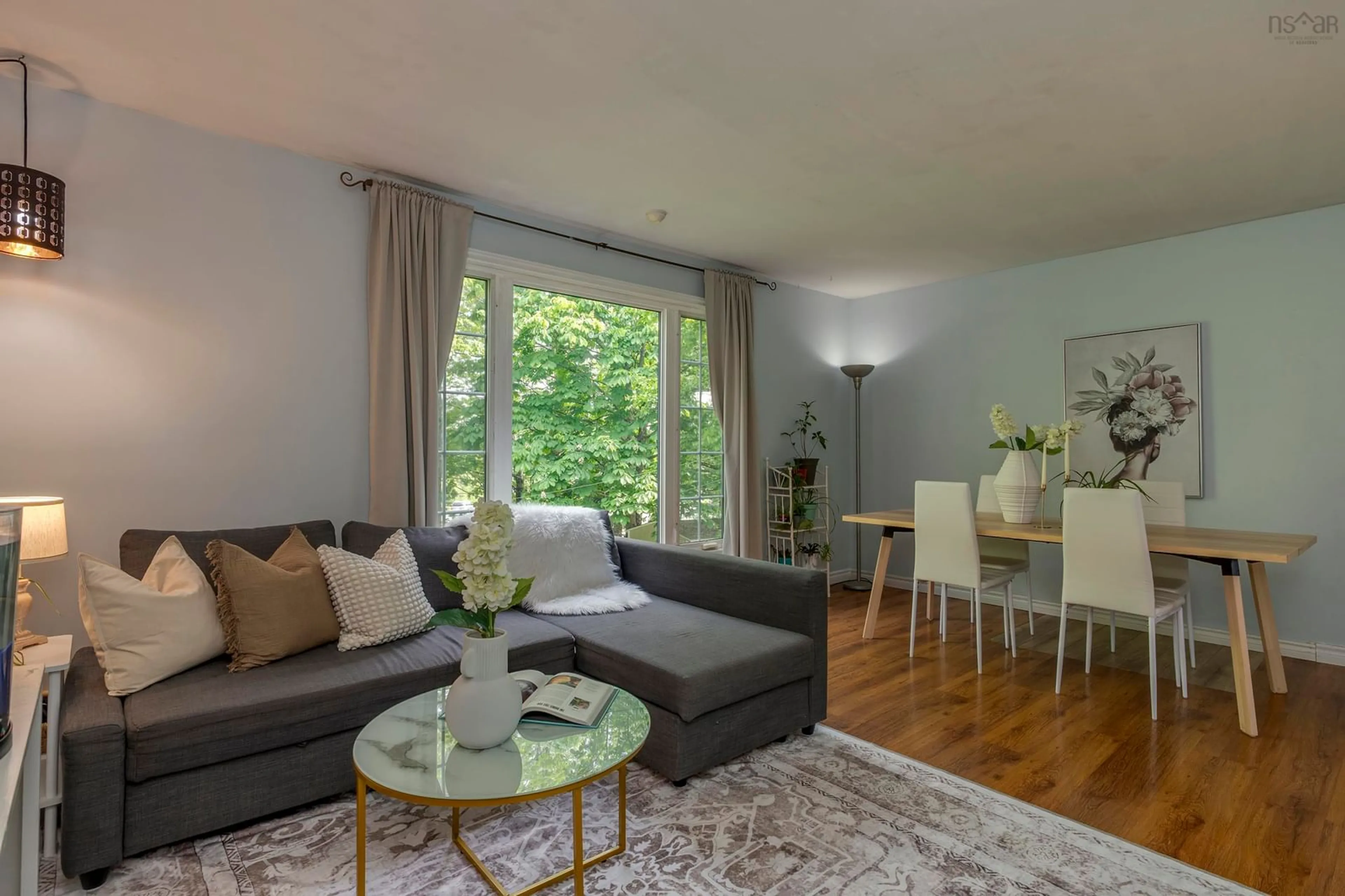 Living room with furniture, wood/laminate floor for 5 Quaker Cres, Lower Sackville Nova Scotia B4C 2Z1