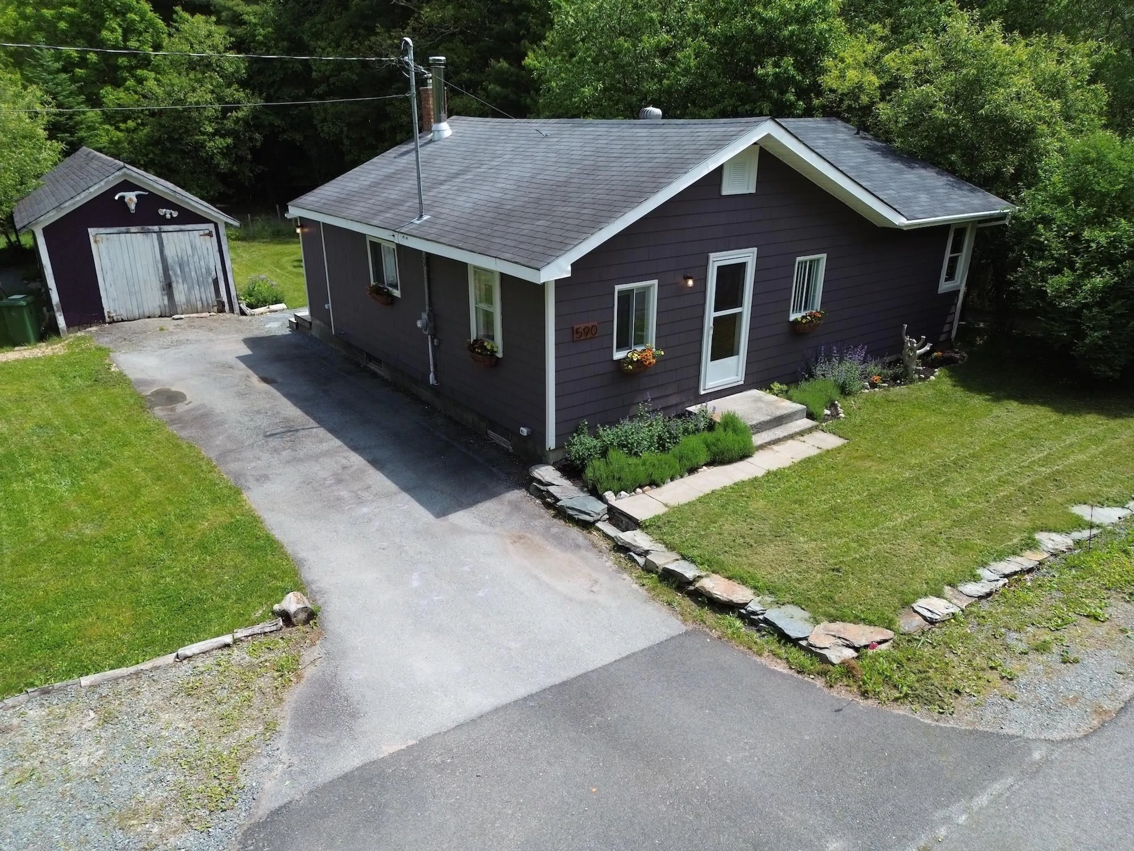 A pic from outside/outdoor area/front of a property/back of a property/a pic from drone, street for 590 Mill Village Road East Rd, Charleston Nova Scotia B0J 2H0