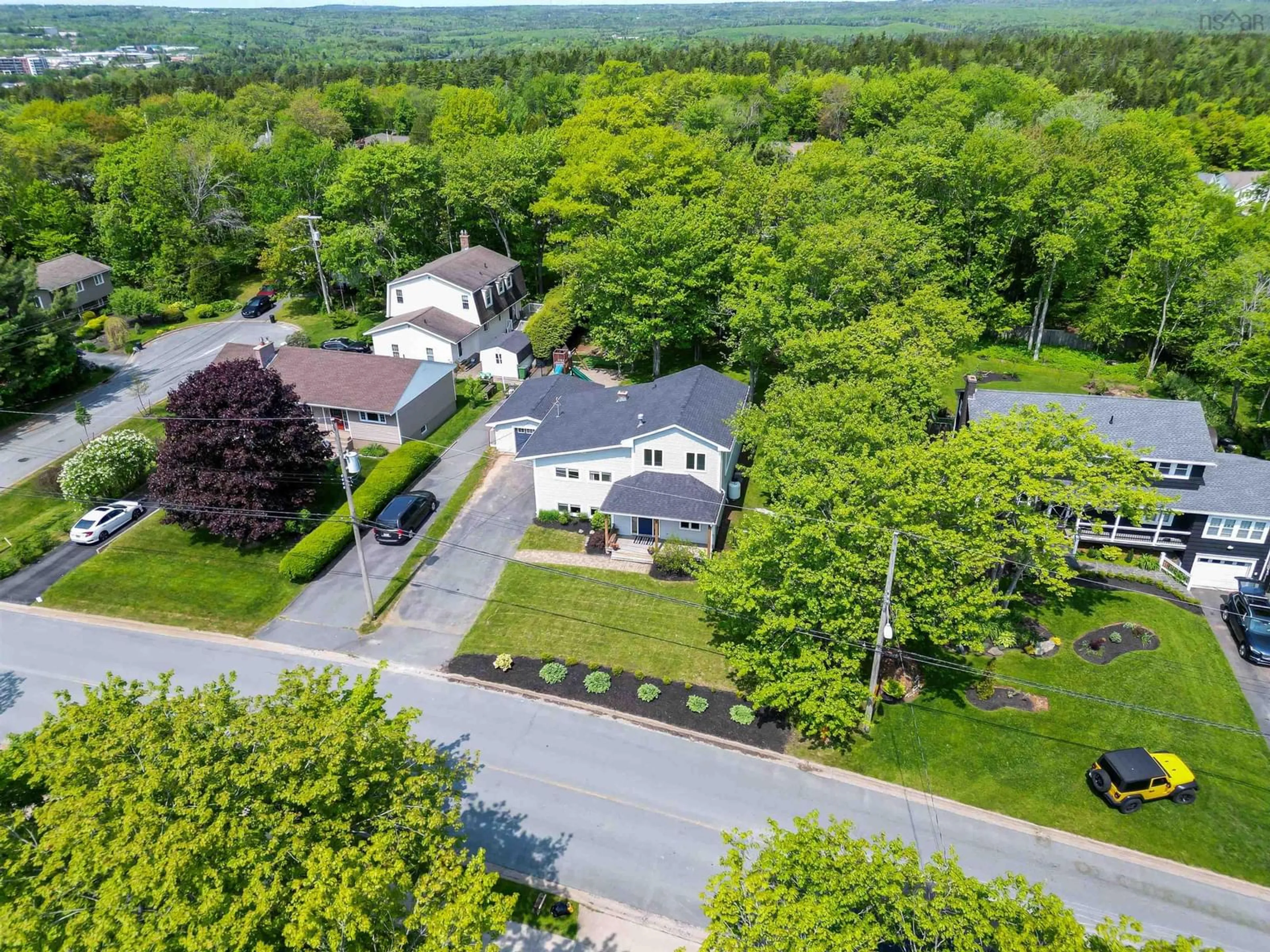 A pic from outside/outdoor area/front of a property/back of a property/a pic from drone, street for 572 Basinview Dr, Bedford Nova Scotia B4A 1T7