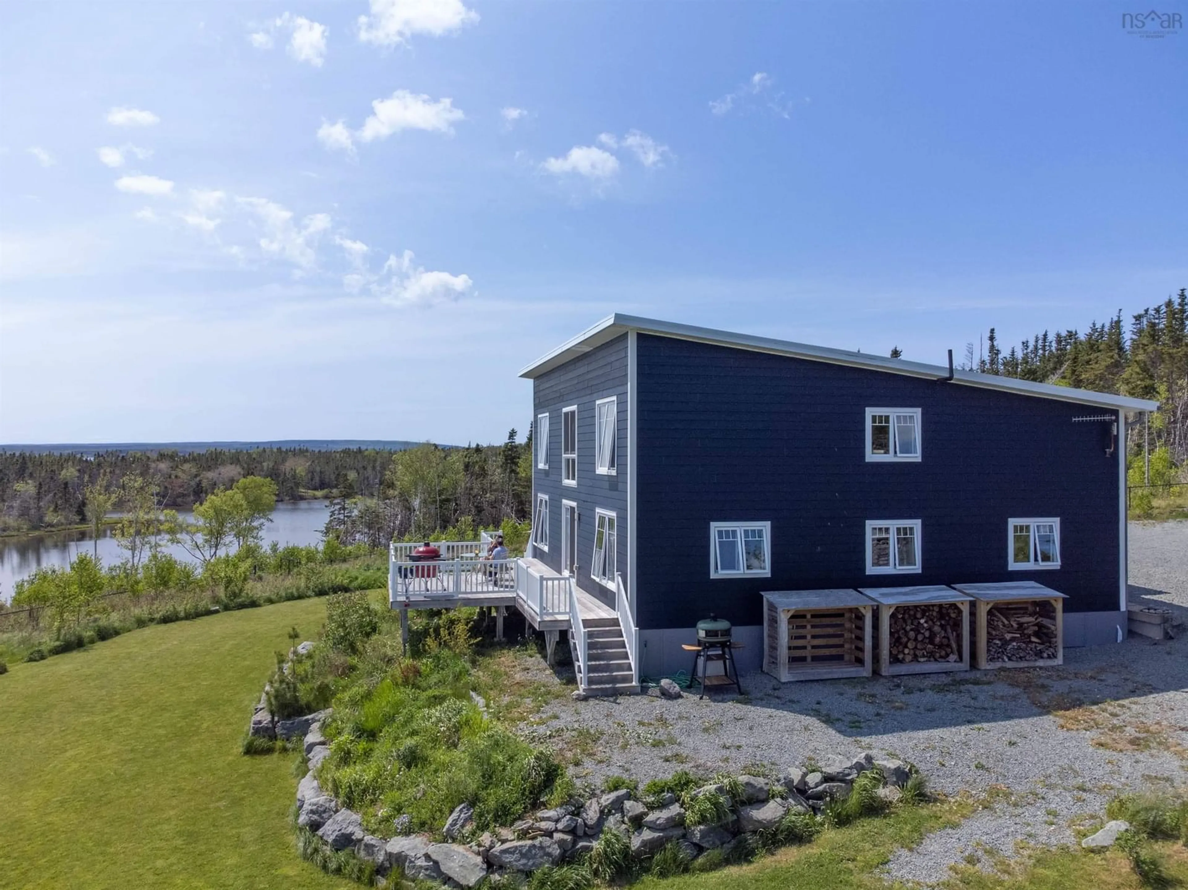 A pic from outside/outdoor area/front of a property/back of a property/a pic from drone, water/lake/river/ocean view for 122 Peter Sosna Dr, Macnabs Cove Nova Scotia B0E 3B0