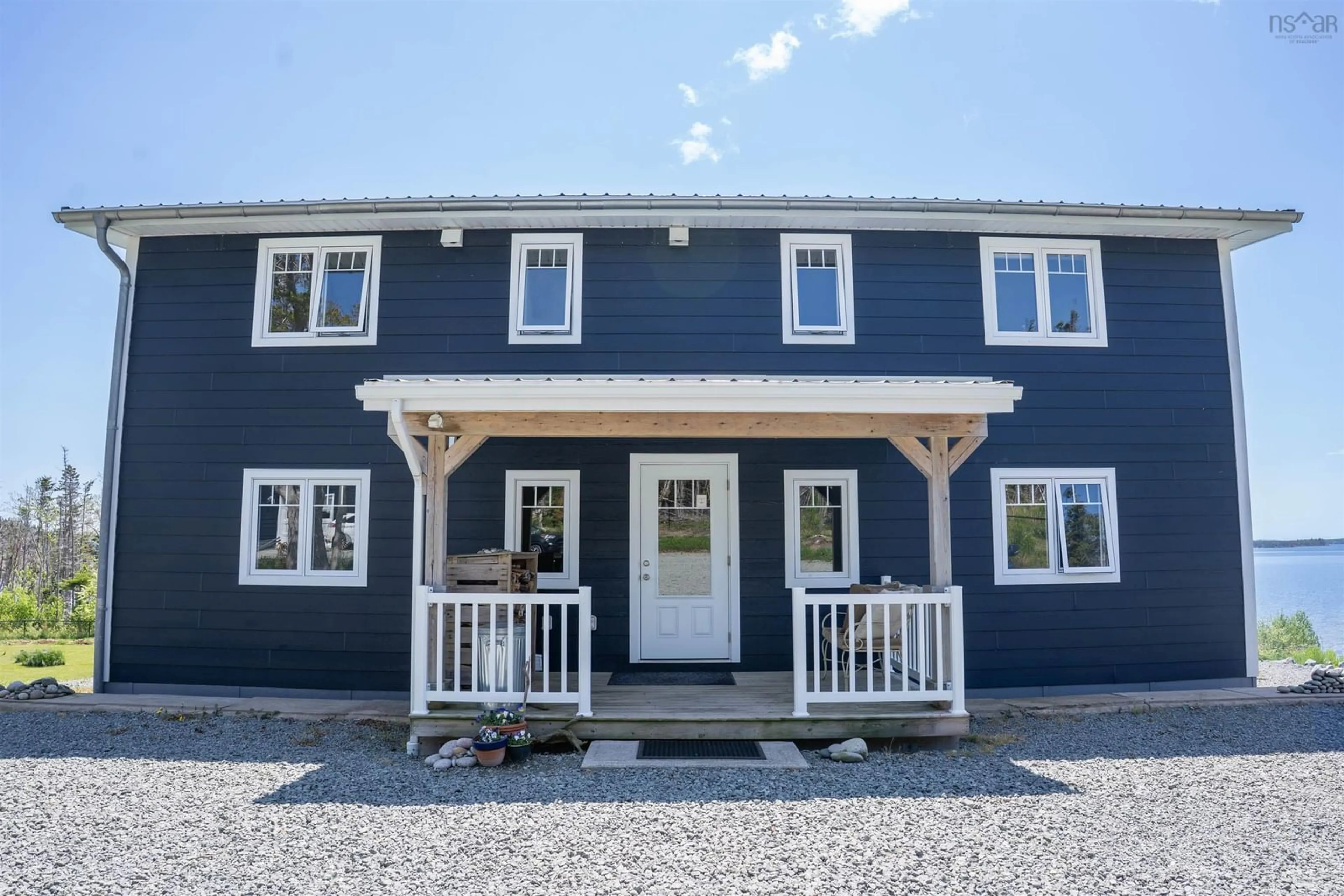 Home with vinyl exterior material, street for 122 Peter Sosna Dr, Macnabs Cove Nova Scotia B0E 3B0
