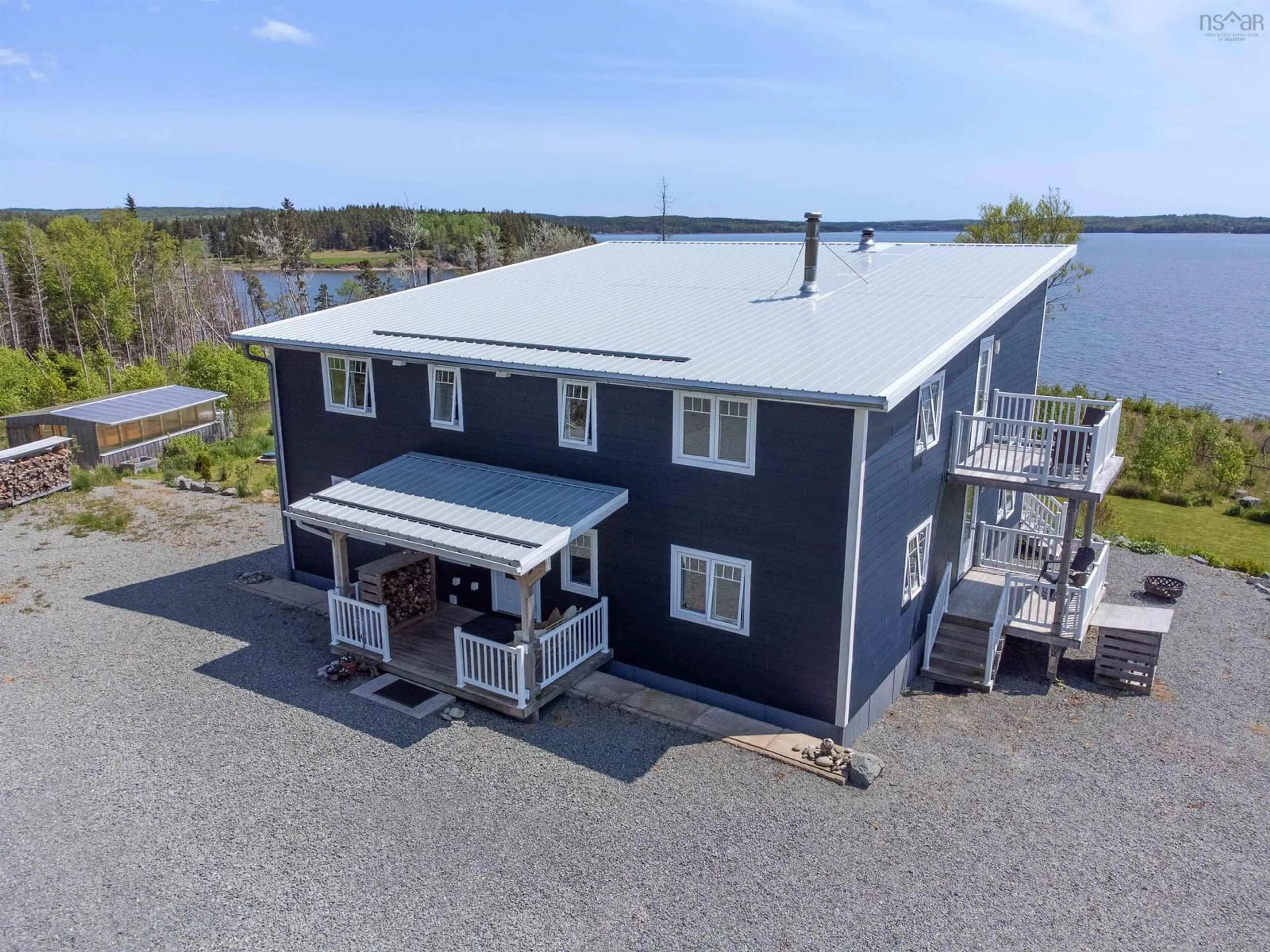 A pic from outside/outdoor area/front of a property/back of a property/a pic from drone, building for 122 Peter Sosna Dr, Macnabs Cove Nova Scotia B0E 3B0