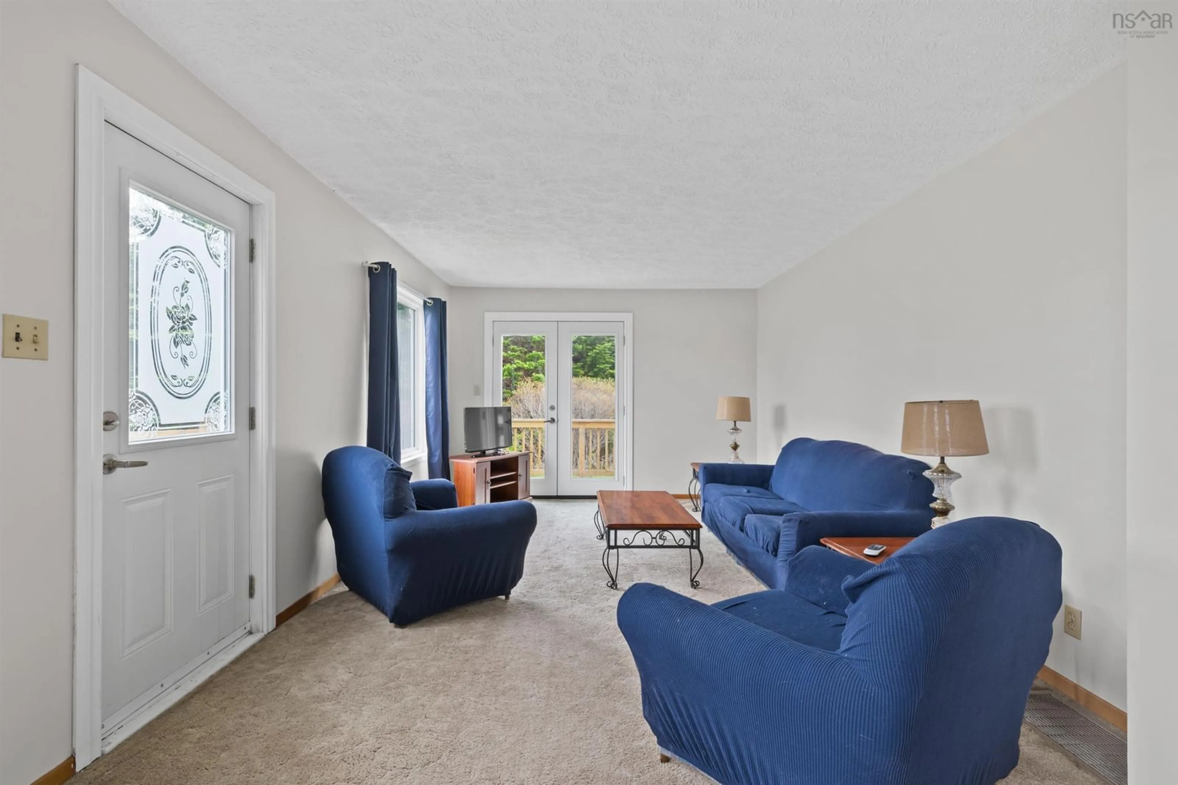 Living room with furniture, carpet floor for 2766 Ostrea Lake Rd, Pleasant Point Nova Scotia B0J 2L0