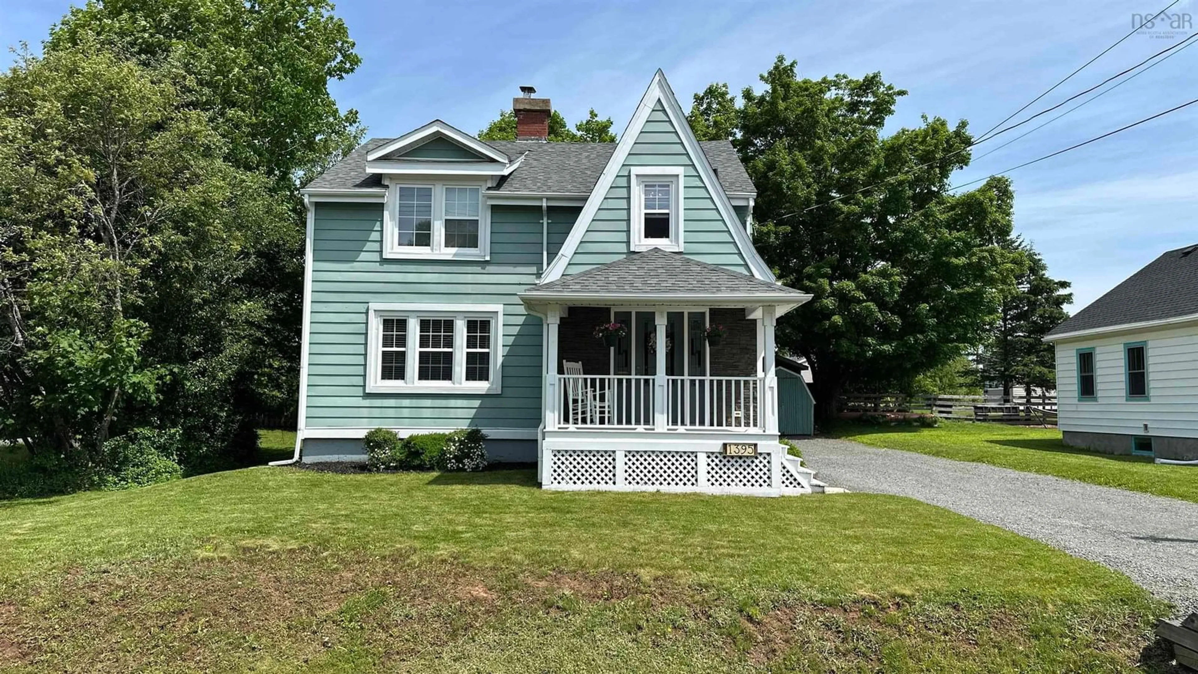 Home with vinyl exterior material, street for 1395 East Prince St, Salmon River Nova Scotia B2N 7G3