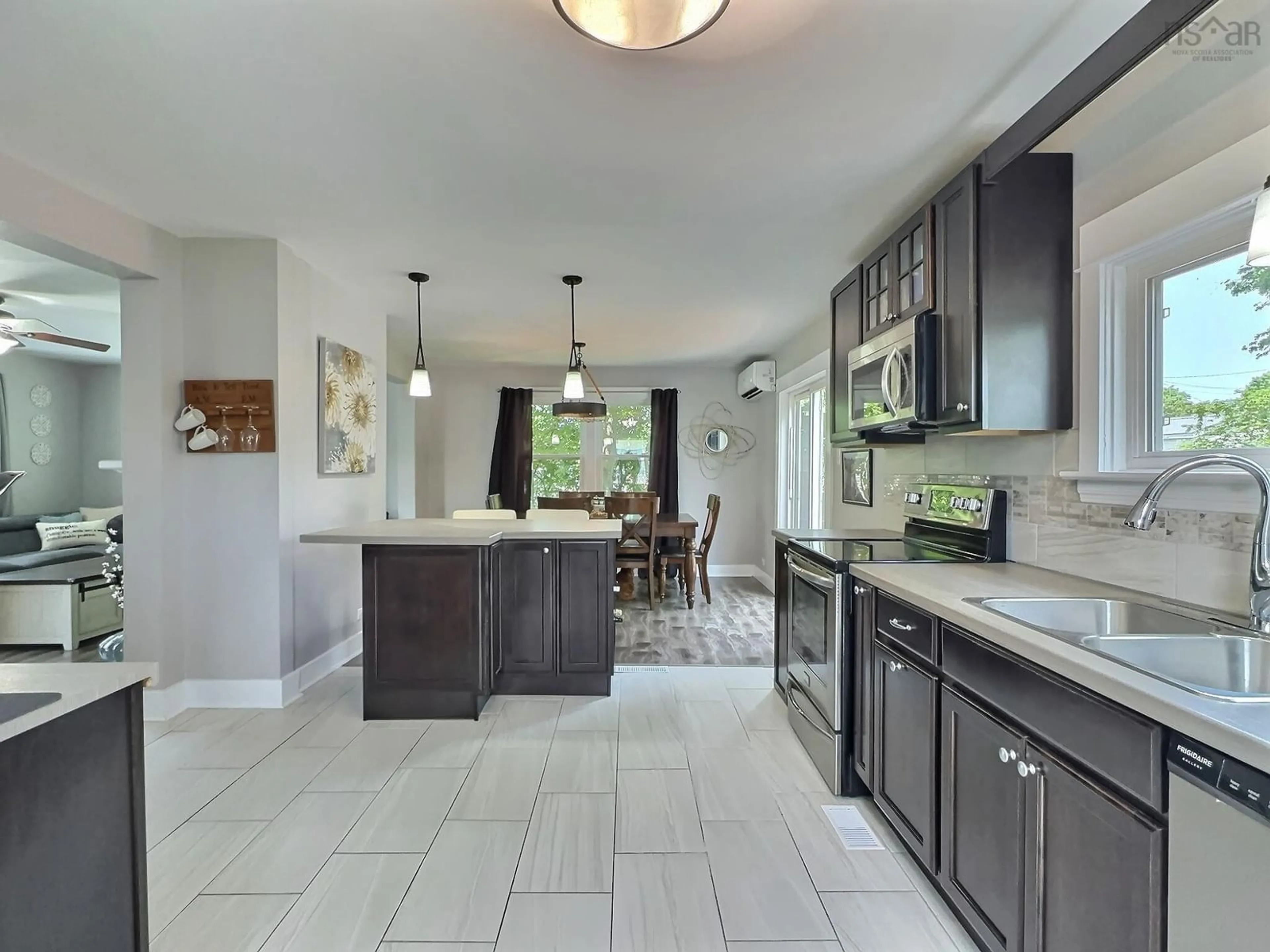 Open concept kitchen, ceramic/tile floor for 1395 East Prince St, Salmon River Nova Scotia B2N 7G3