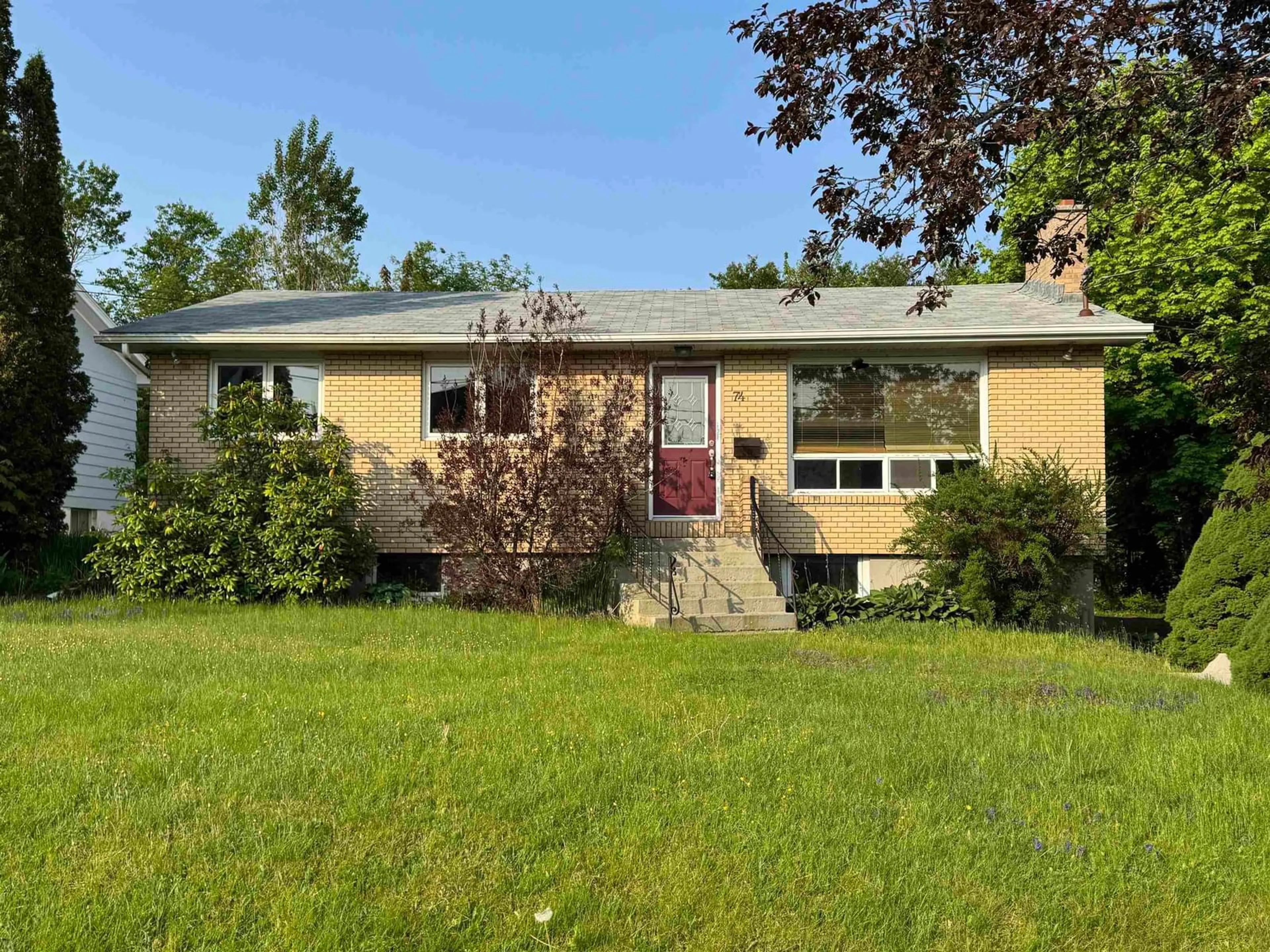 Home with vinyl exterior material, street for 74 Moxham Dr, Sydney Nova Scotia B1S 2A1