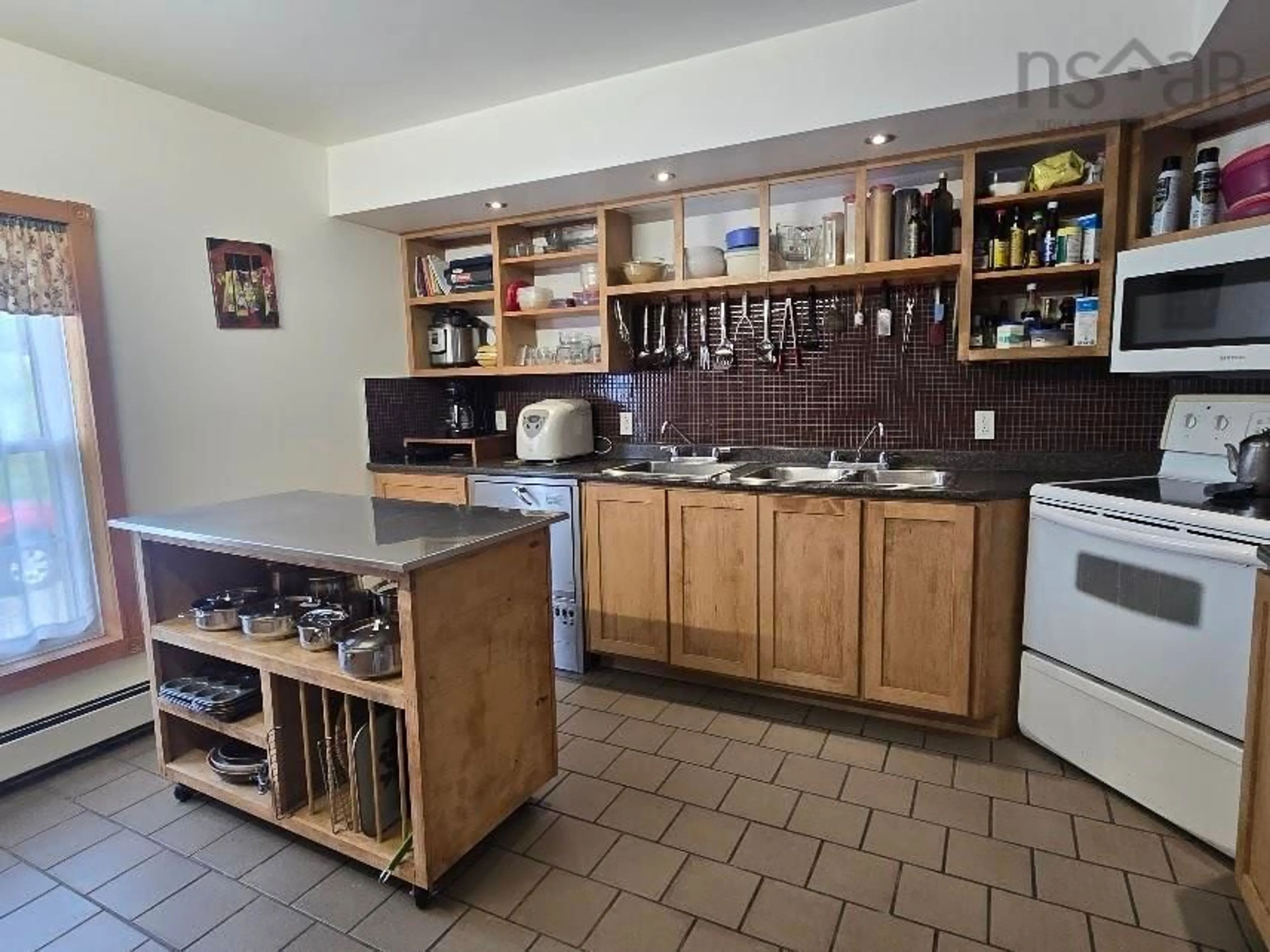 Standard kitchen, ceramic/tile floor for 2901 Malagash Rd, Malagash Centre Nova Scotia B0K 1E0