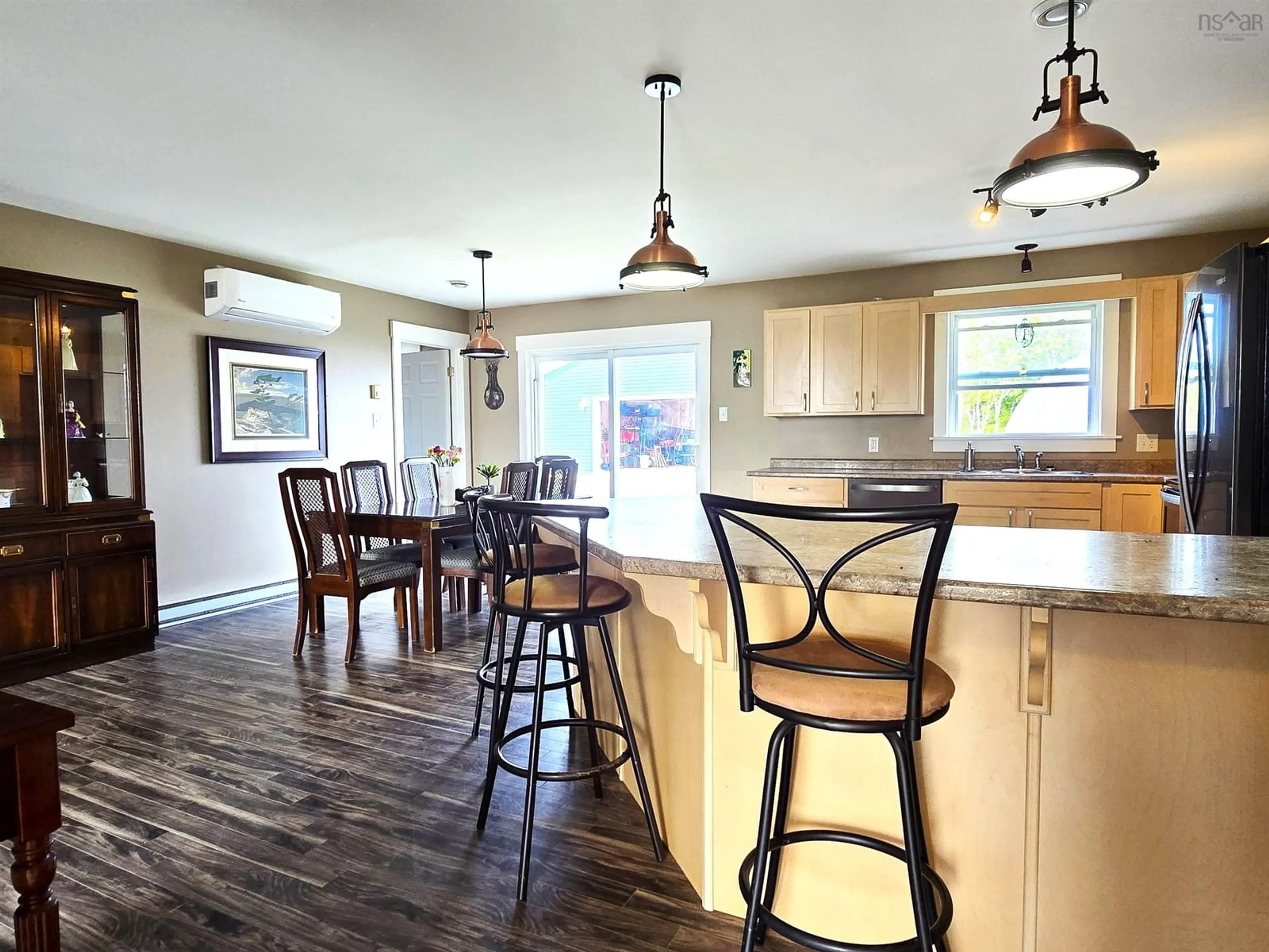 Open concept kitchen, wood/laminate floor for 281 Heselton Dr, Ostrea Lake Nova Scotia B0J 2L0