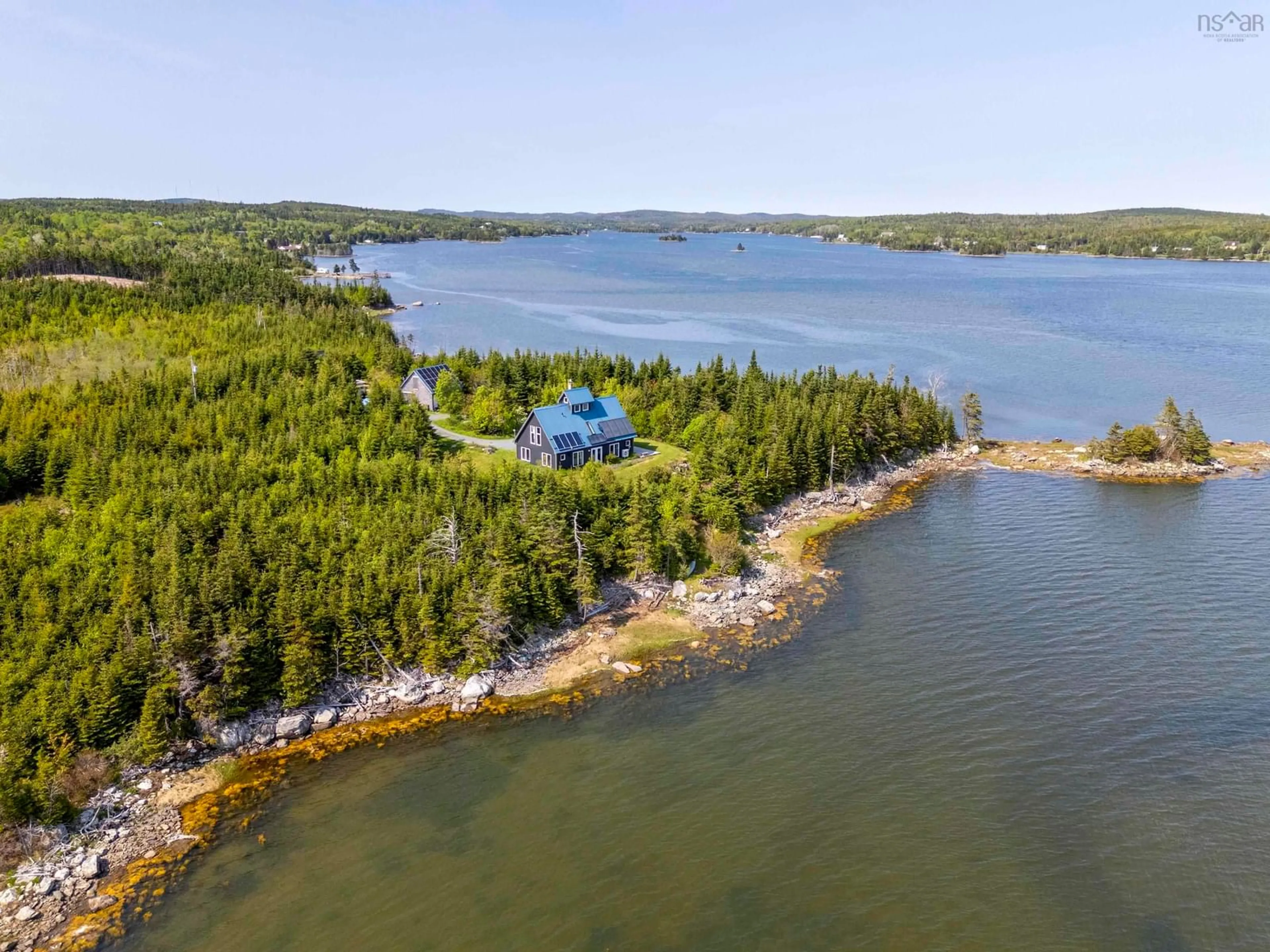 A pic from outside/outdoor area/front of a property/back of a property/a pic from drone, water/lake/river/ocean view for 899 West Petpeswick Rd, West Petpeswick Nova Scotia B0J 2L0