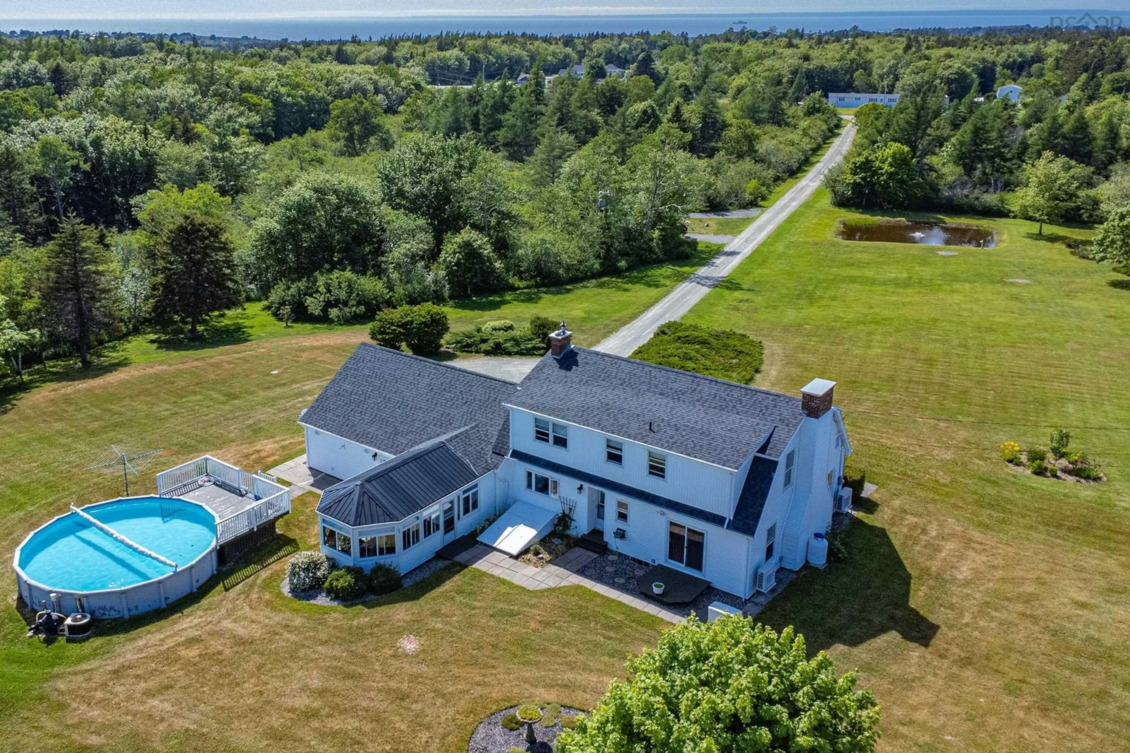 A pic from outside/outdoor area/front of a property/back of a property/a pic from drone, water/lake/river/ocean view for 532 Saulnierville Rd, Saulnierville Station Nova Scotia B0W 2Z0