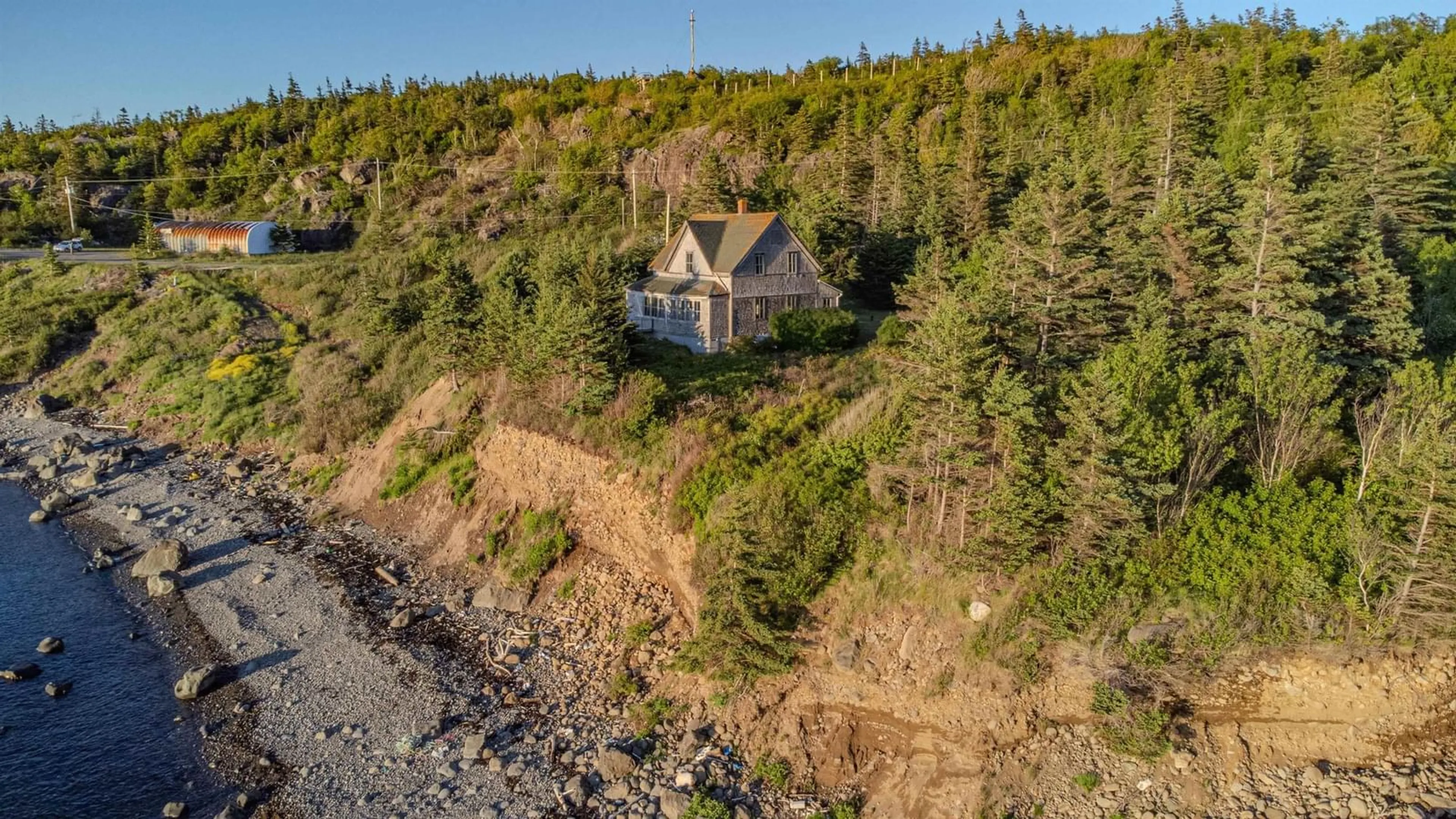 A pic from outside/outdoor area/front of a property/back of a property/a pic from drone, water/lake/river/ocean view for 223 Whale Cove Road, Whale Cove Nova Scotia B0V 1E0