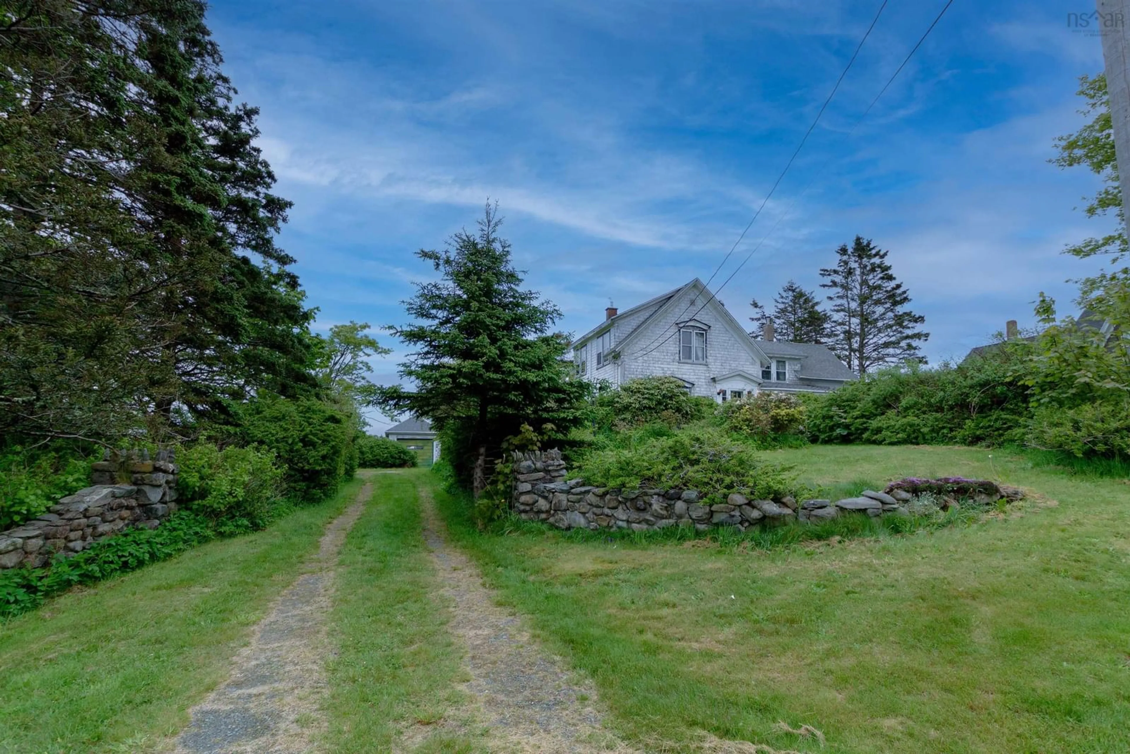 A pic from outside/outdoor area/front of a property/back of a property/a pic from drone, street for 2880 No 1 Hwy, Port Maitland Nova Scotia B5A 4A5
