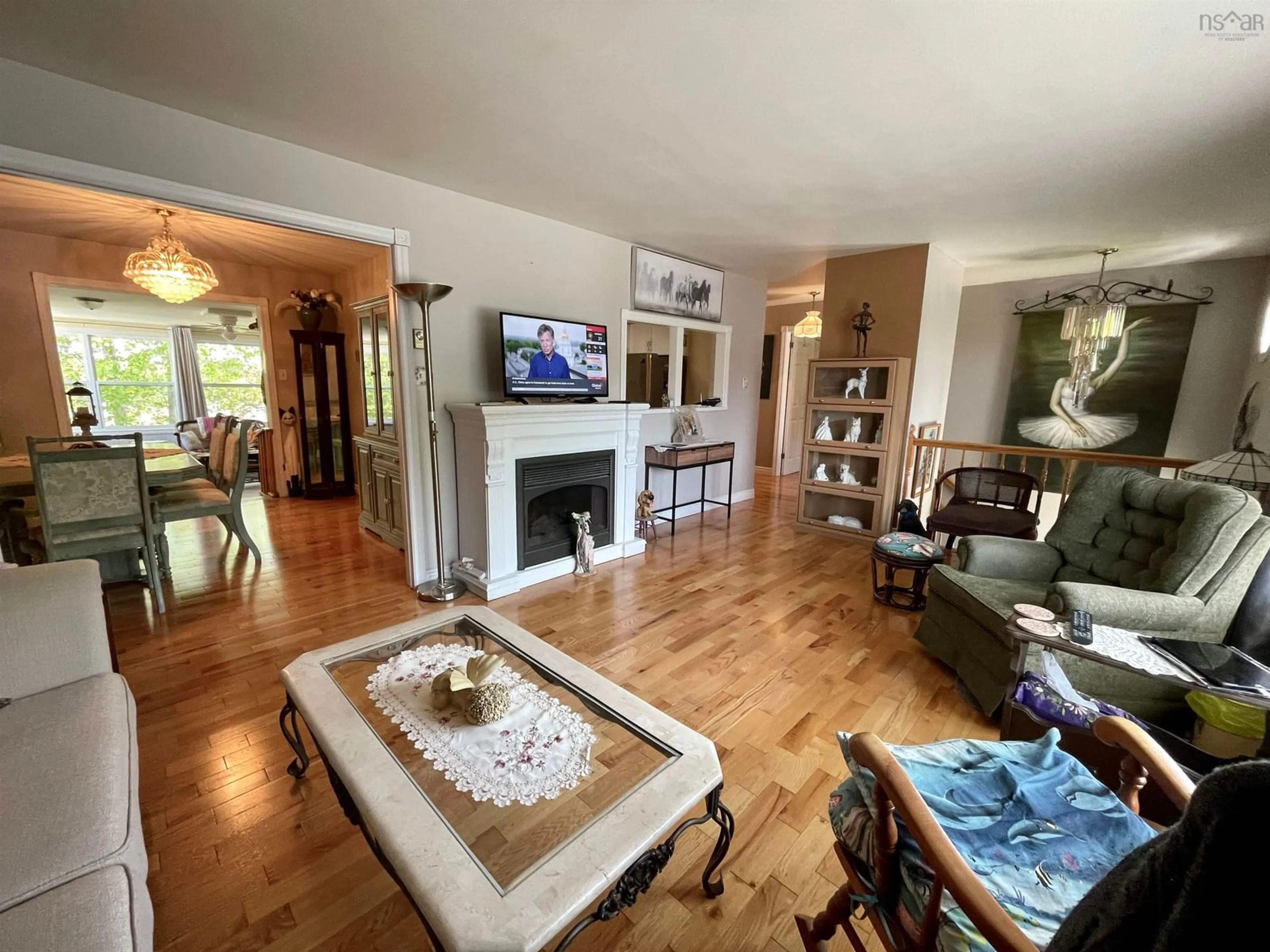 Living room with furniture, wood/laminate floor for 61 Portland Estates Blvd West, Dartmouth Nova Scotia B2W 6E5