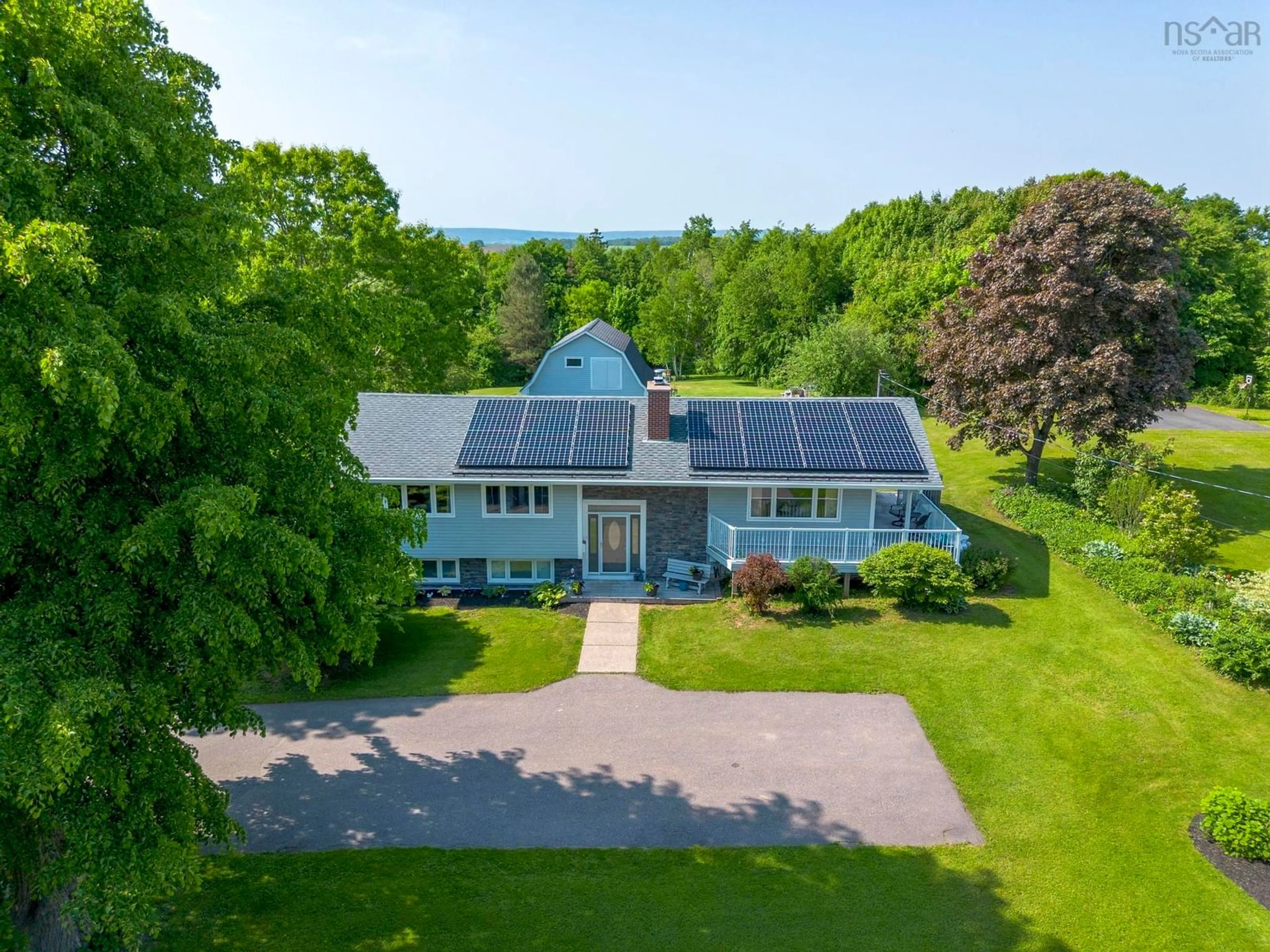 A pic from outside/outdoor area/front of a property/back of a property/a pic from drone, unknown for 9521 Commercial St, New Minas Nova Scotia B4N 3G3