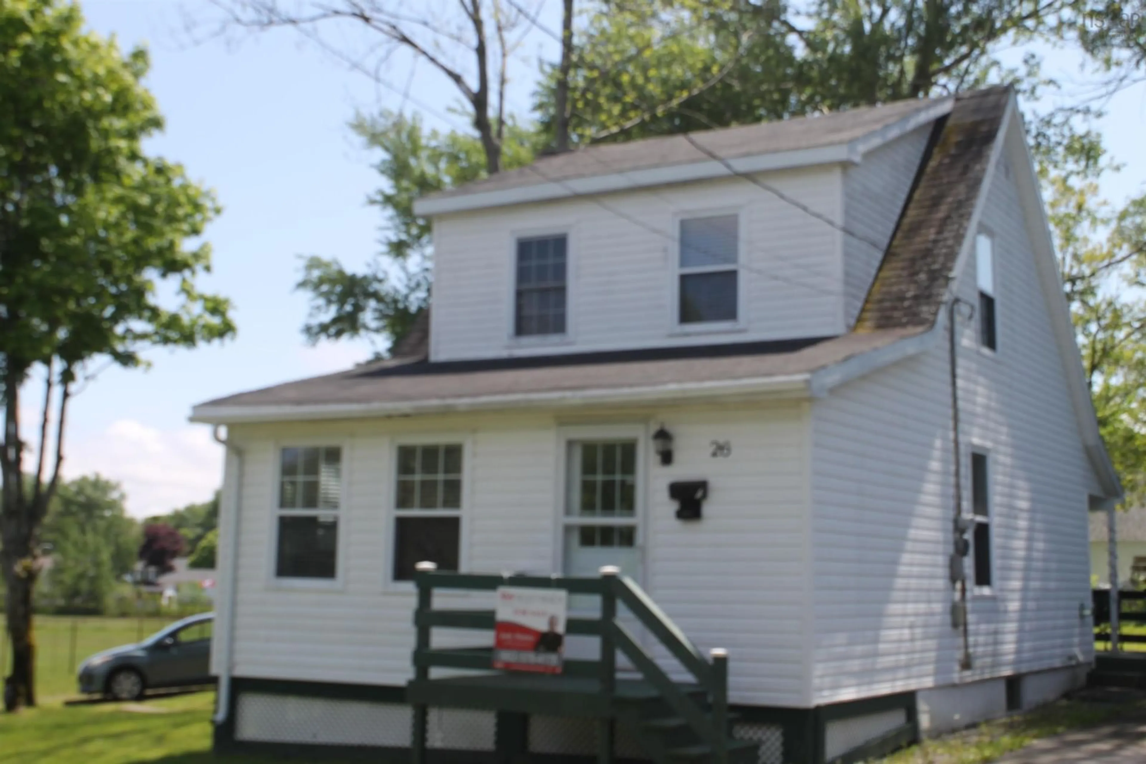 Home with vinyl exterior material, street for 26 Dwyer St, Sydney Mines Nova Scotia B1V 1E7