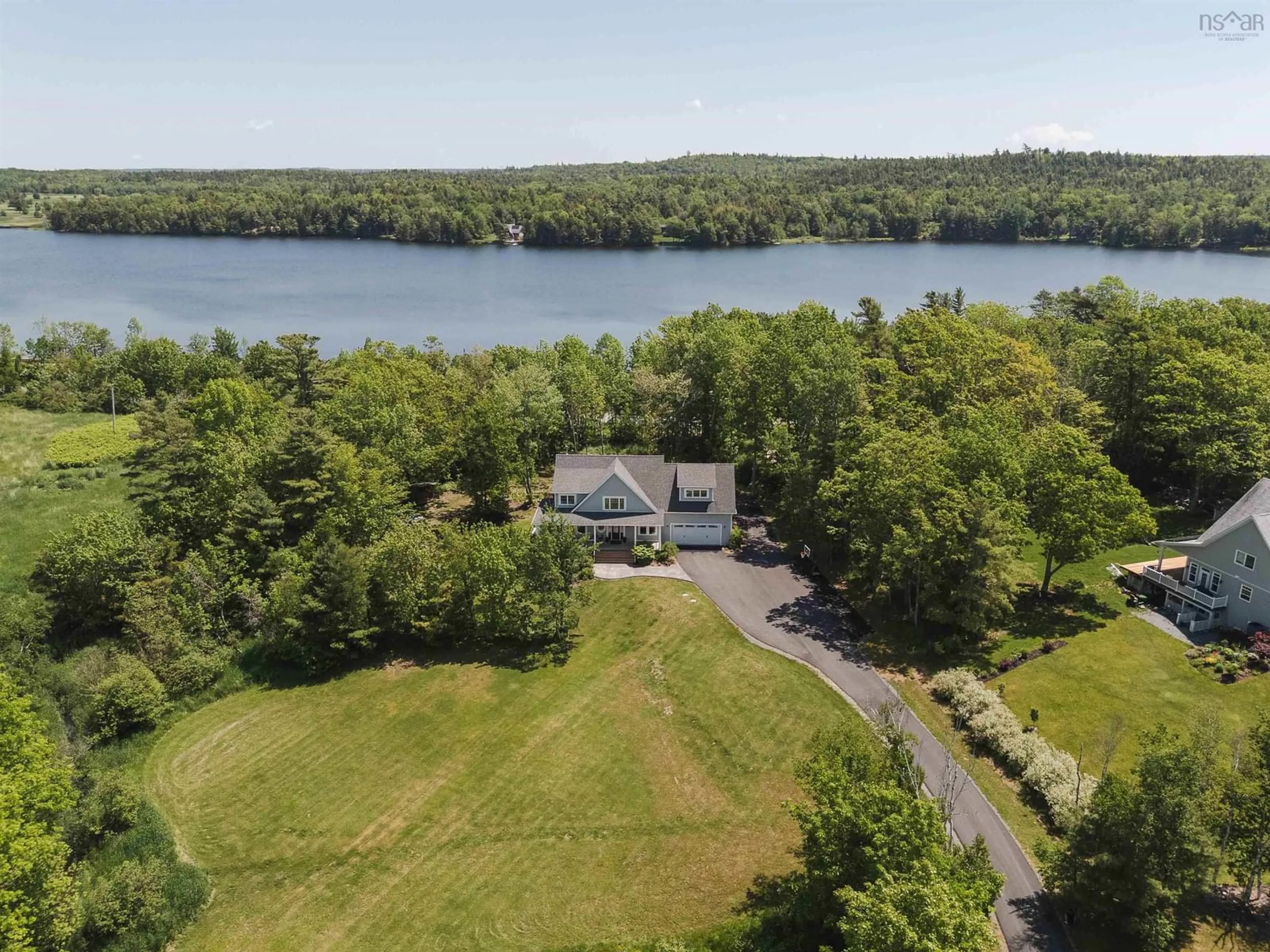 A pic from outside/outdoor area/front of a property/back of a property/a pic from drone, water/lake/river/ocean view for 25 Meadowvale Lane, Oakfield Nova Scotia B2T 1B3