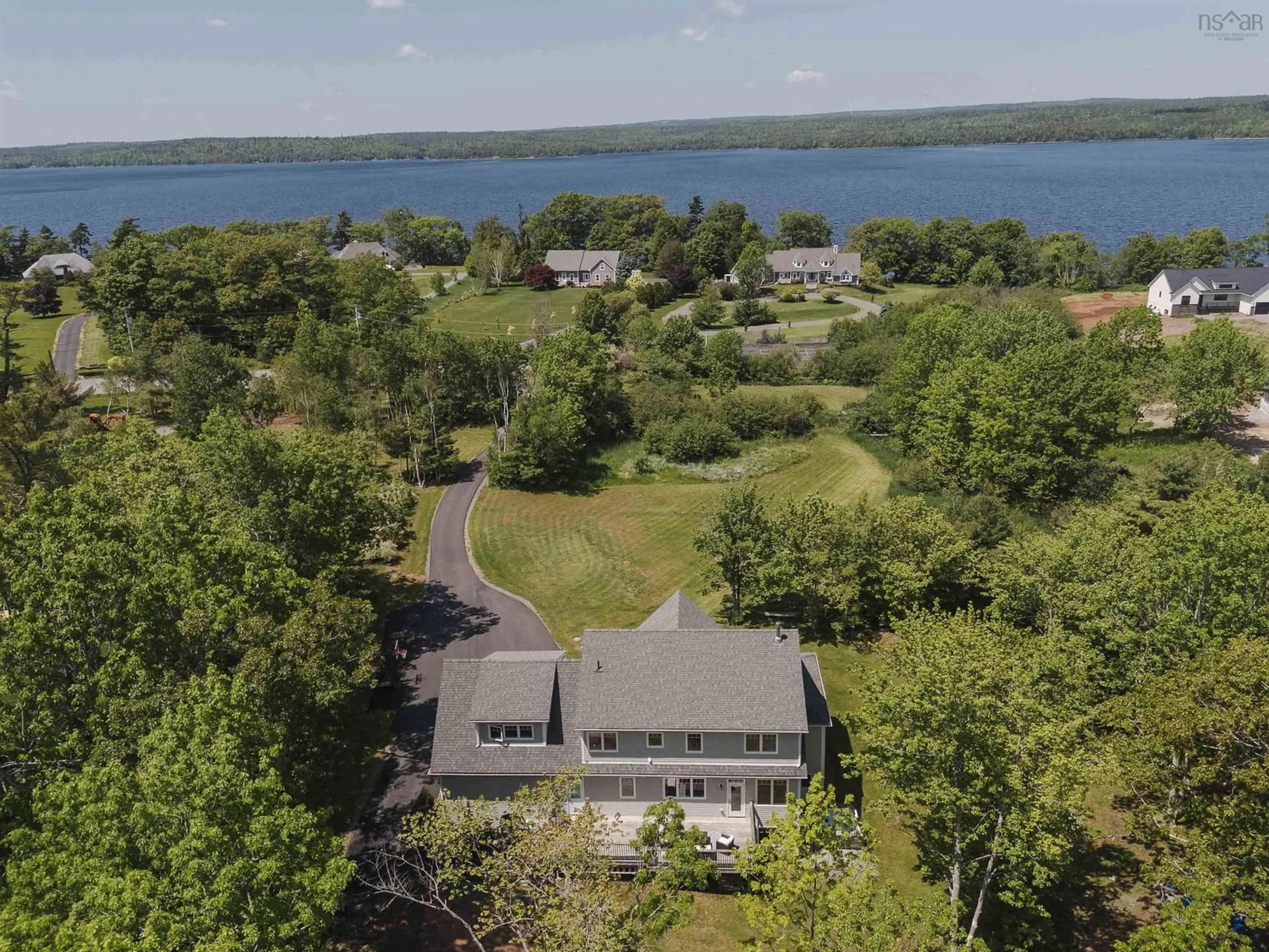 A pic from outside/outdoor area/front of a property/back of a property/a pic from drone, water/lake/river/ocean view for 25 Meadowvale Lane, Oakfield Nova Scotia B2T 1B3