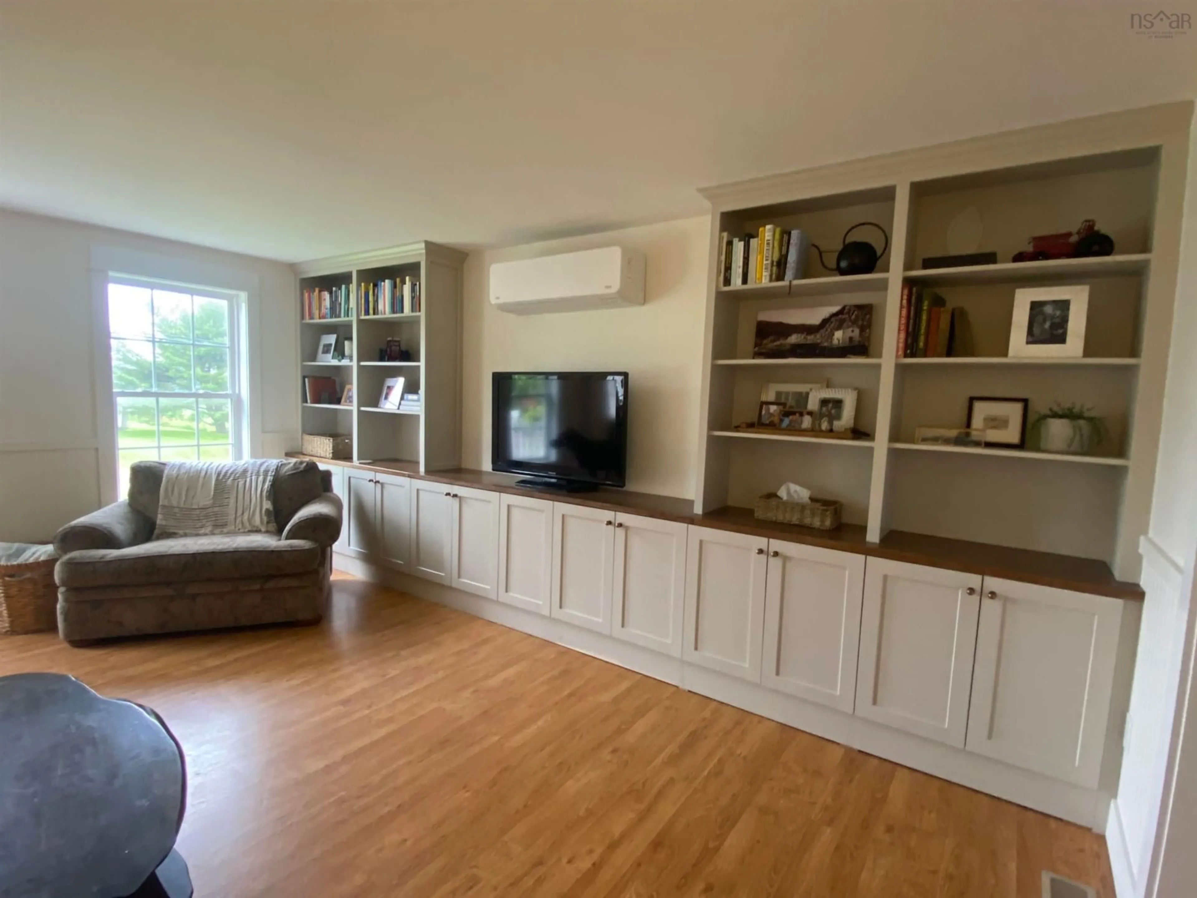 Living room with furniture, wood/laminate floor for 171 Kent Rd, Lower Truro Nova Scotia B6L 1L3