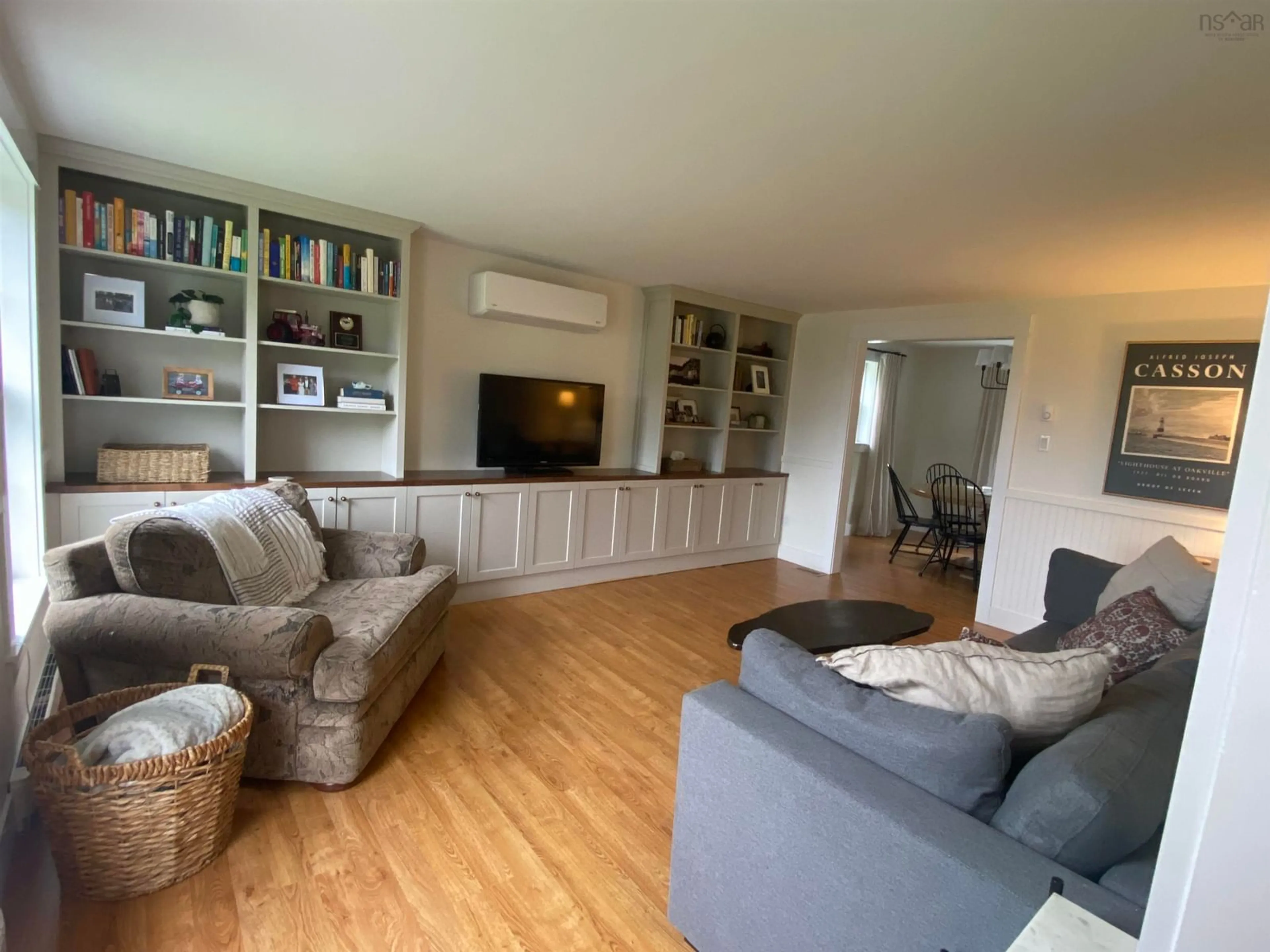 Living room with furniture, wood/laminate floor for 171 Kent Rd, Lower Truro Nova Scotia B6L 1L3
