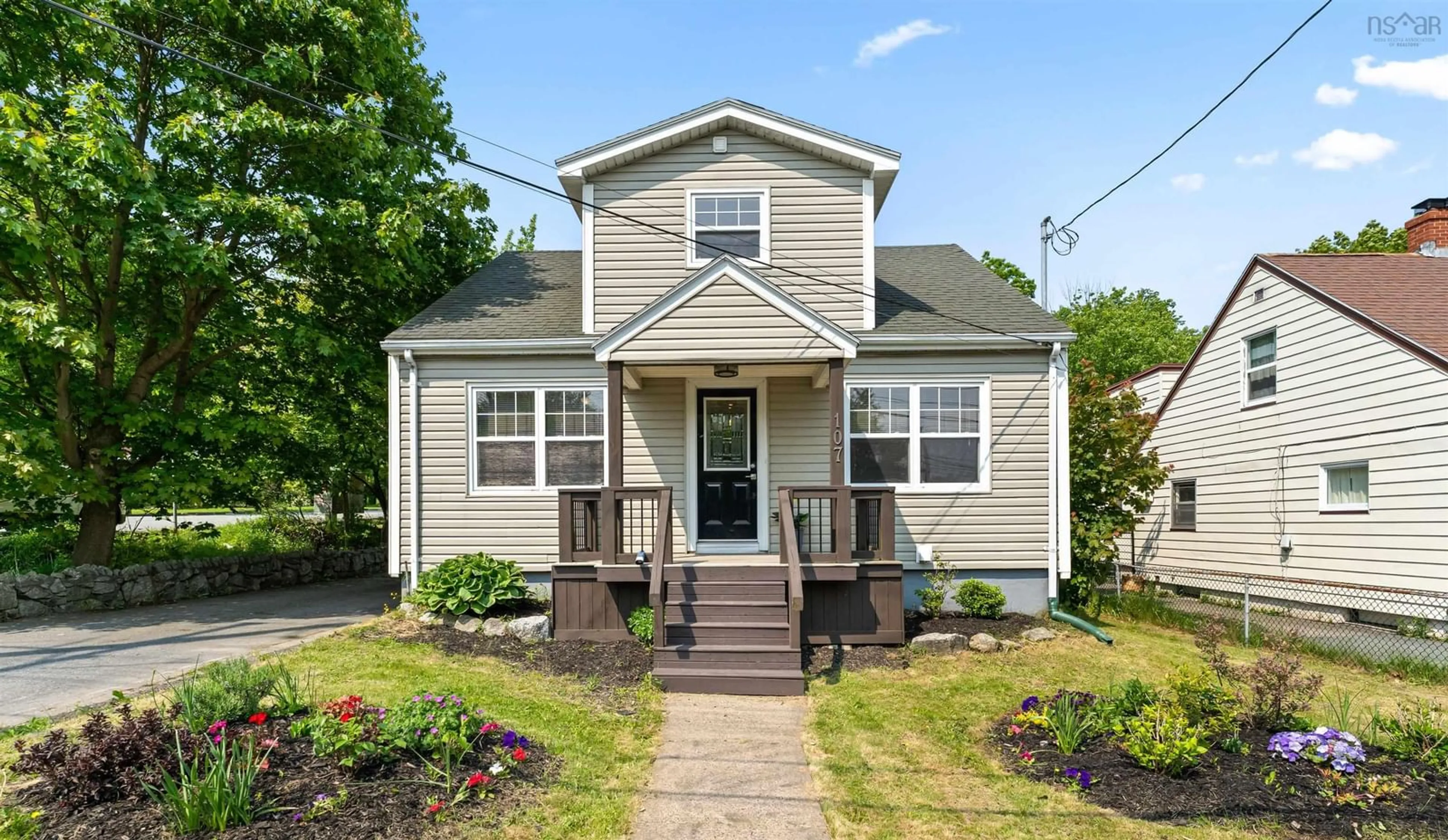 Home with vinyl exterior material, street for 107 Herring Cove Rd, Spryfield Nova Scotia B3P 1K5
